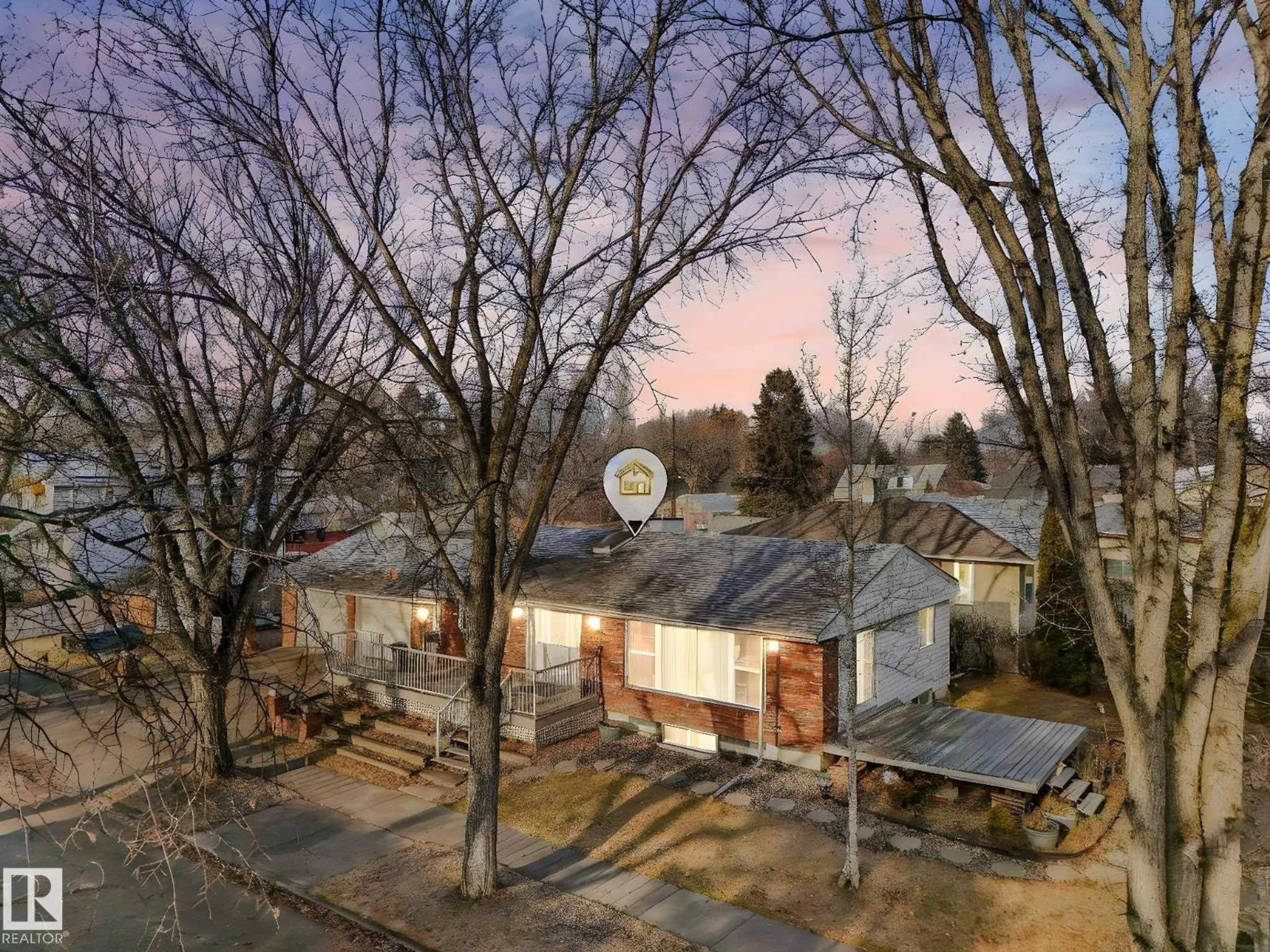 A pic from outside/outdoor area/front of a property/back of a property/a pic from drone, street for 12904 119A AV, Edmonton Alberta T5L2P4