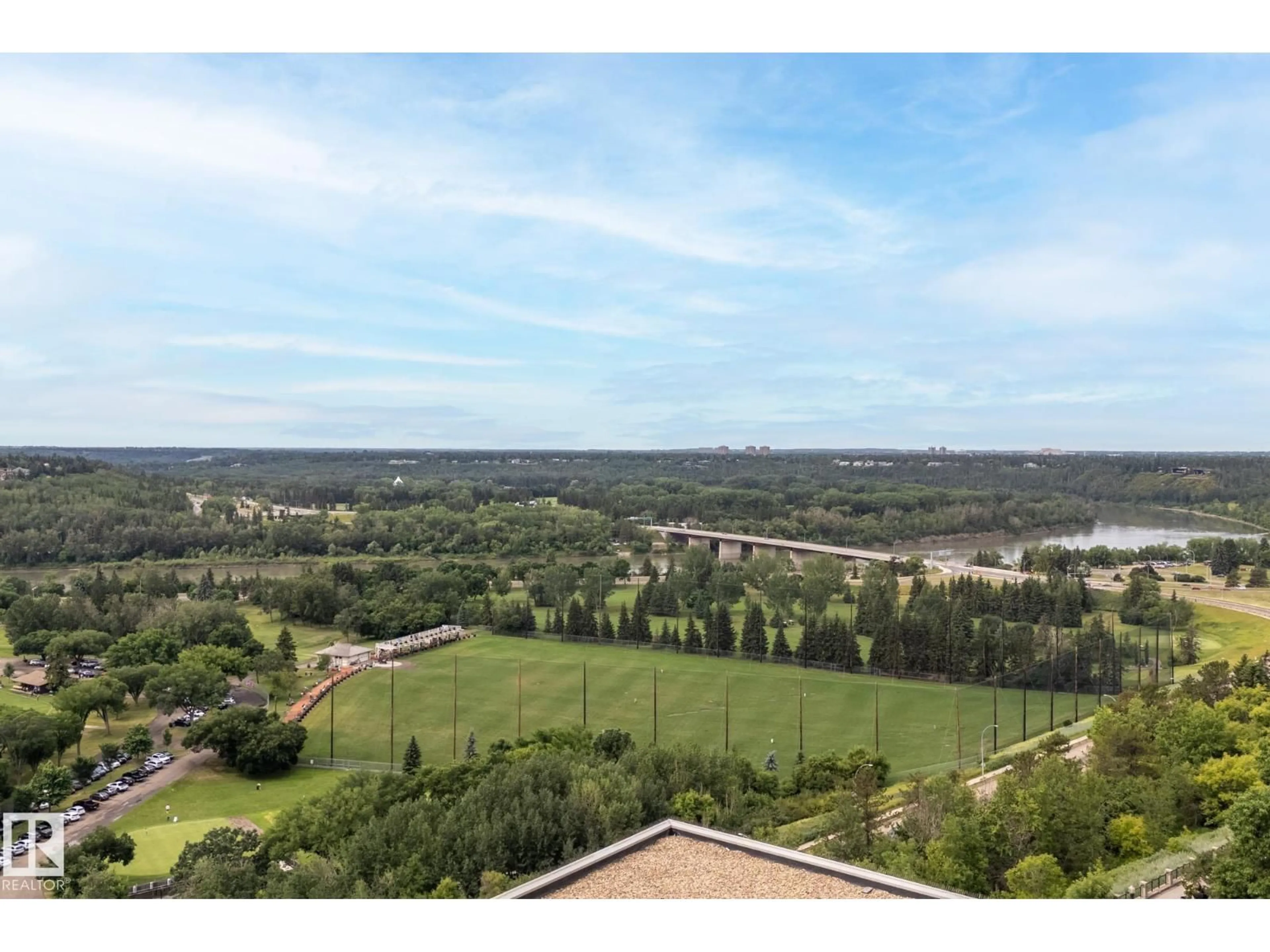 A pic from outside/outdoor area/front of a property/back of a property/a pic from drone, water/lake/river/ocean view for 11933 - 1200 JASPER AV, Edmonton Alberta T5K0P1
