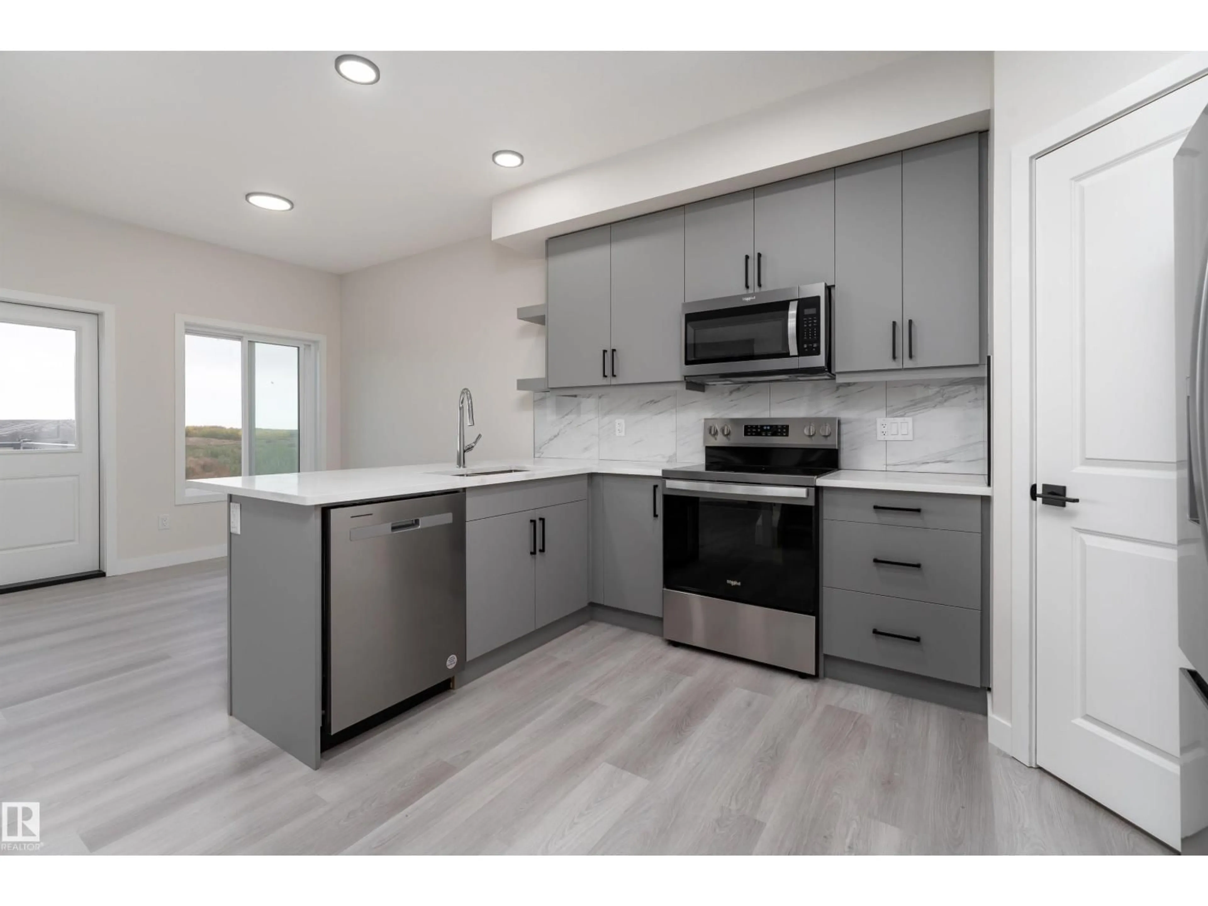 Open concept kitchen, unknown for 137 PATRIOT WAY, Spruce Grove Alberta T7X3W1