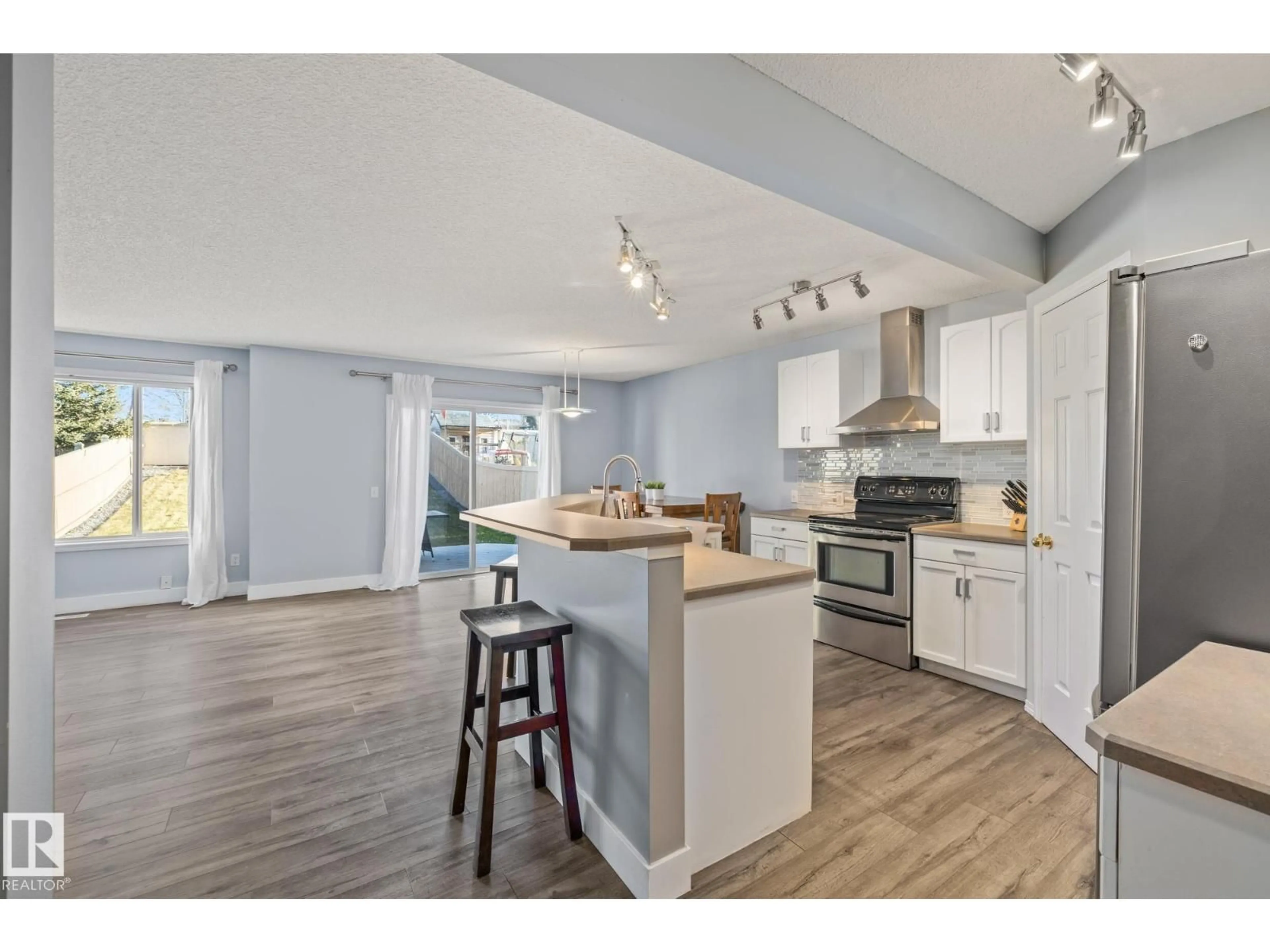 Open concept kitchen, wood/laminate floor for 160 BRIGHTON BA, Sherwood Park Alberta T8H2C2