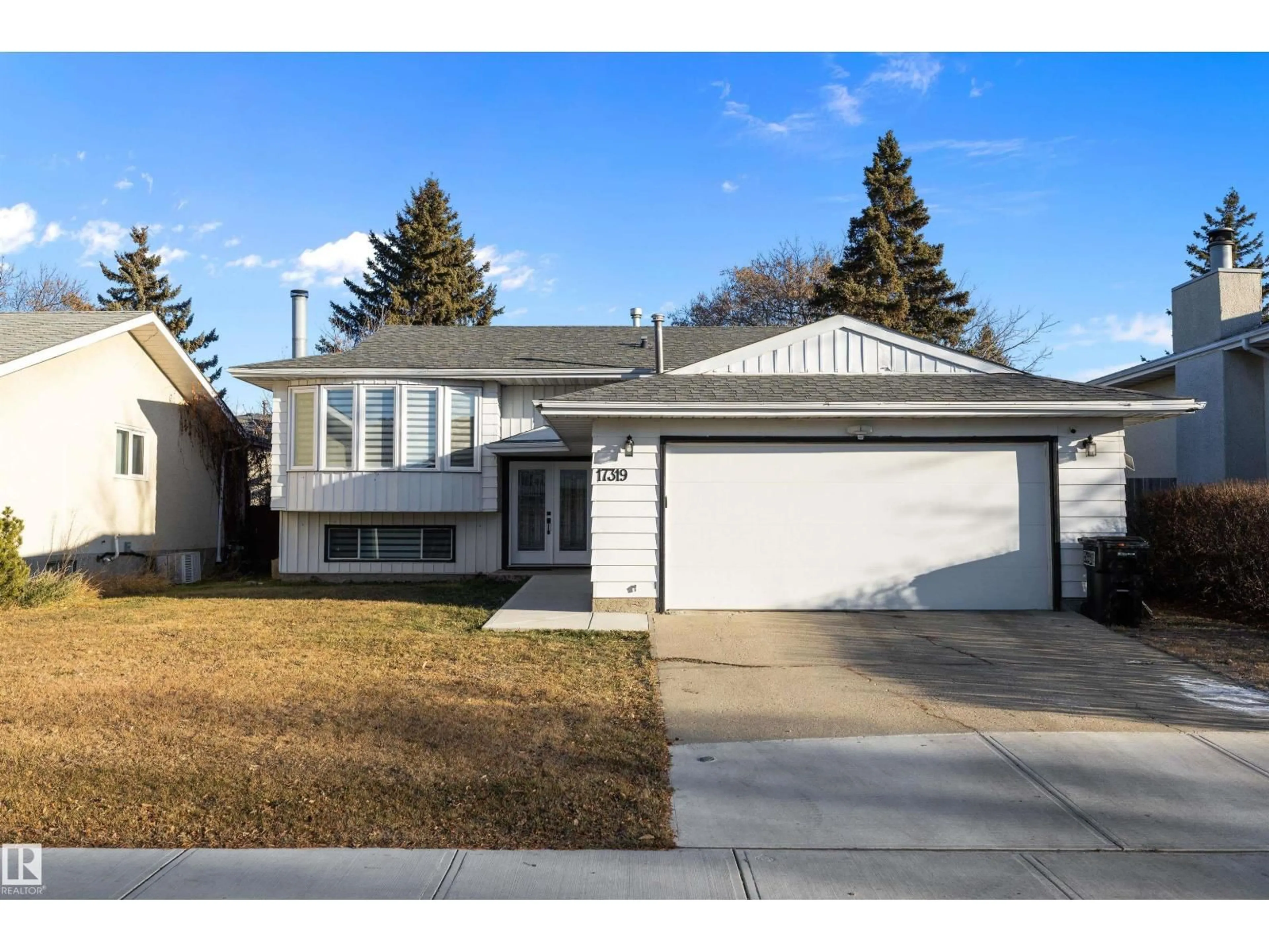 Home with vinyl exterior material, street for NW - 17319 107 ST, Edmonton Alberta T5X3H5