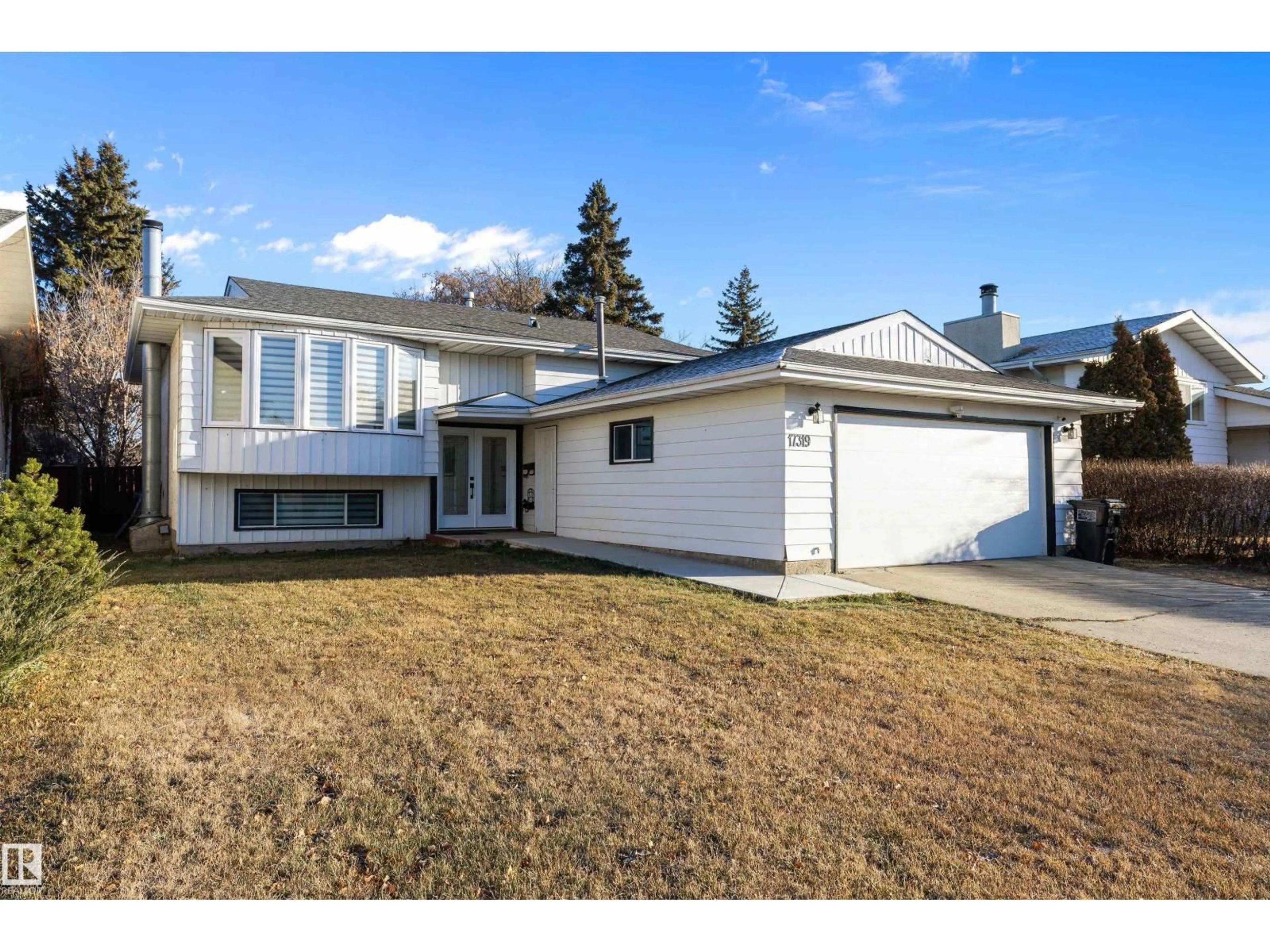 Home with vinyl exterior material, street for NW - 17319 107 ST, Edmonton Alberta T5X3H5