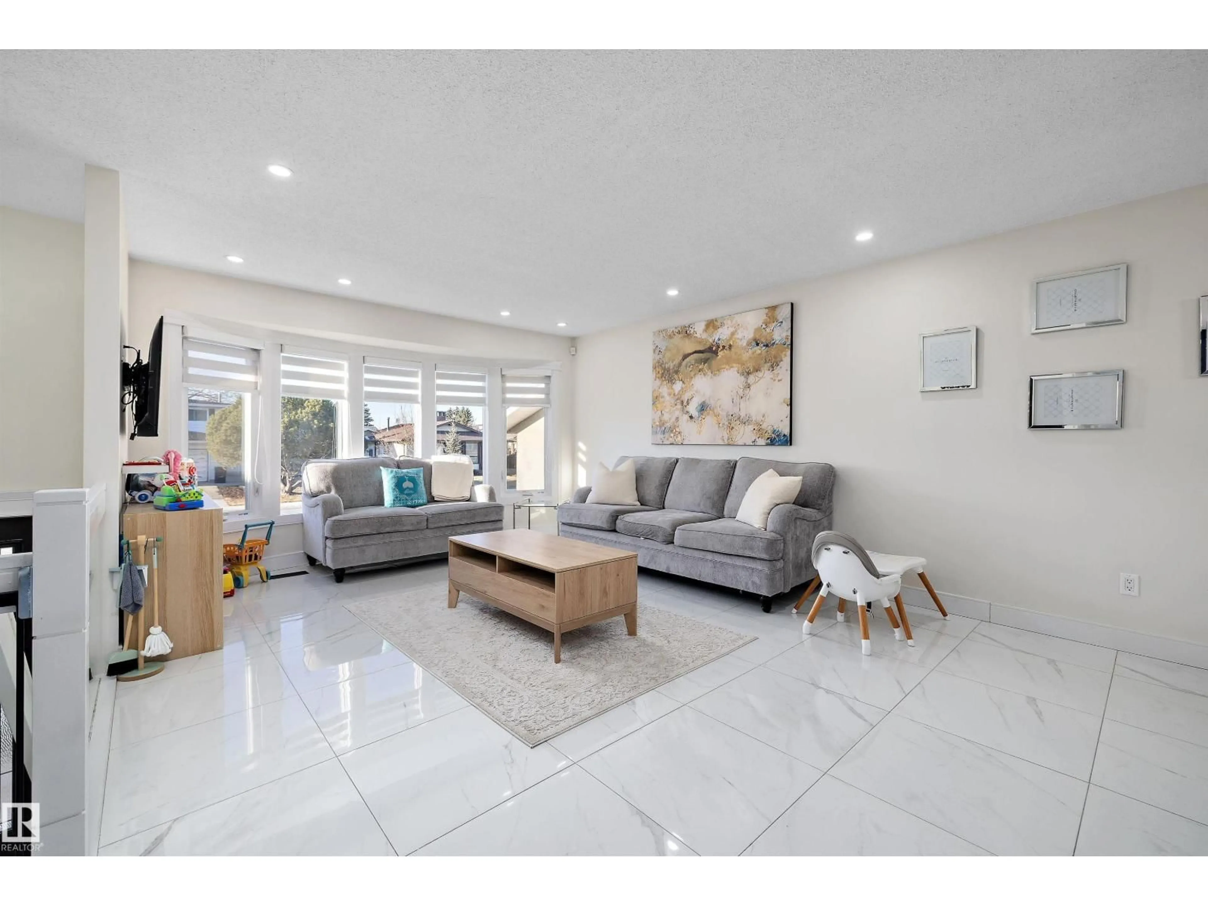 Living room with furniture, ceramic/tile floor for NW - 17319 107 ST, Edmonton Alberta T5X3H5