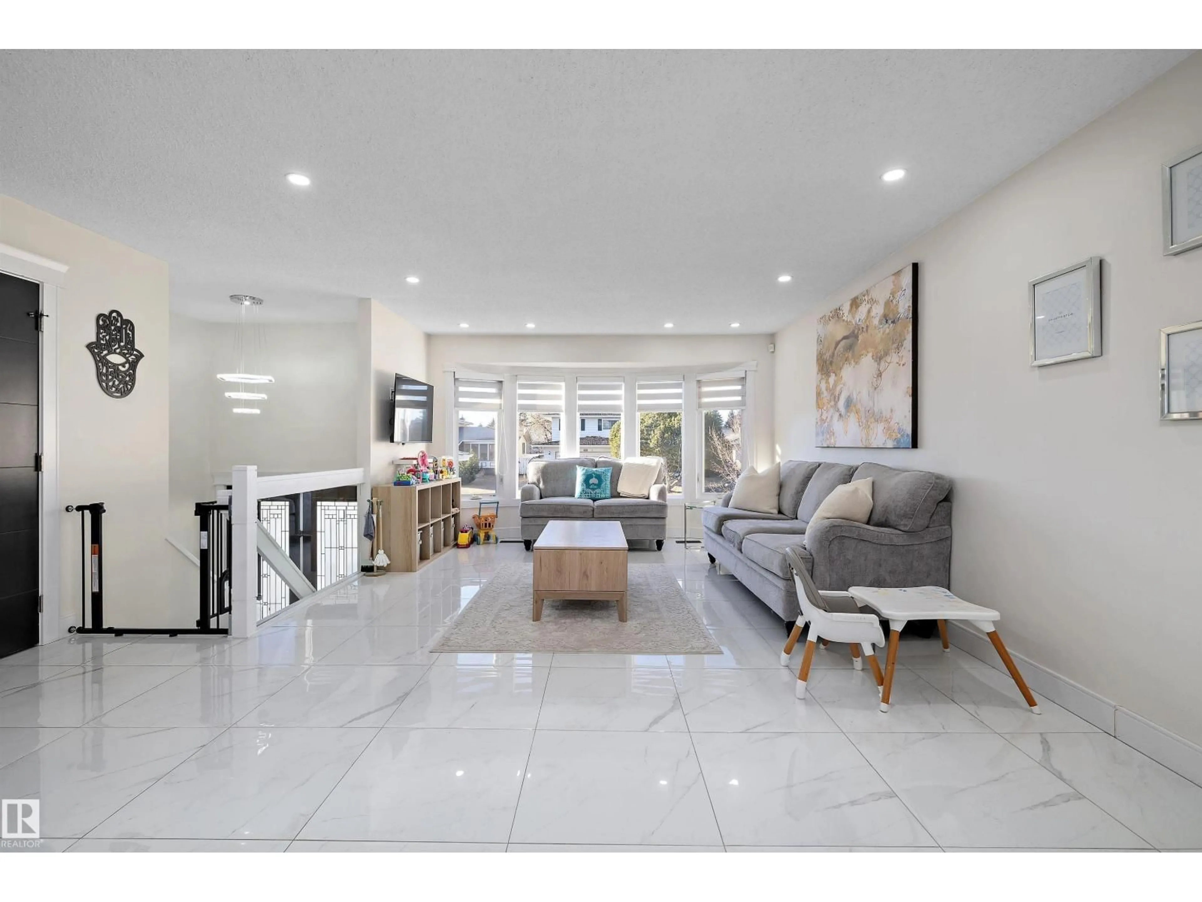 Living room with furniture, ceramic/tile floor for NW - 17319 107 ST, Edmonton Alberta T5X3H5