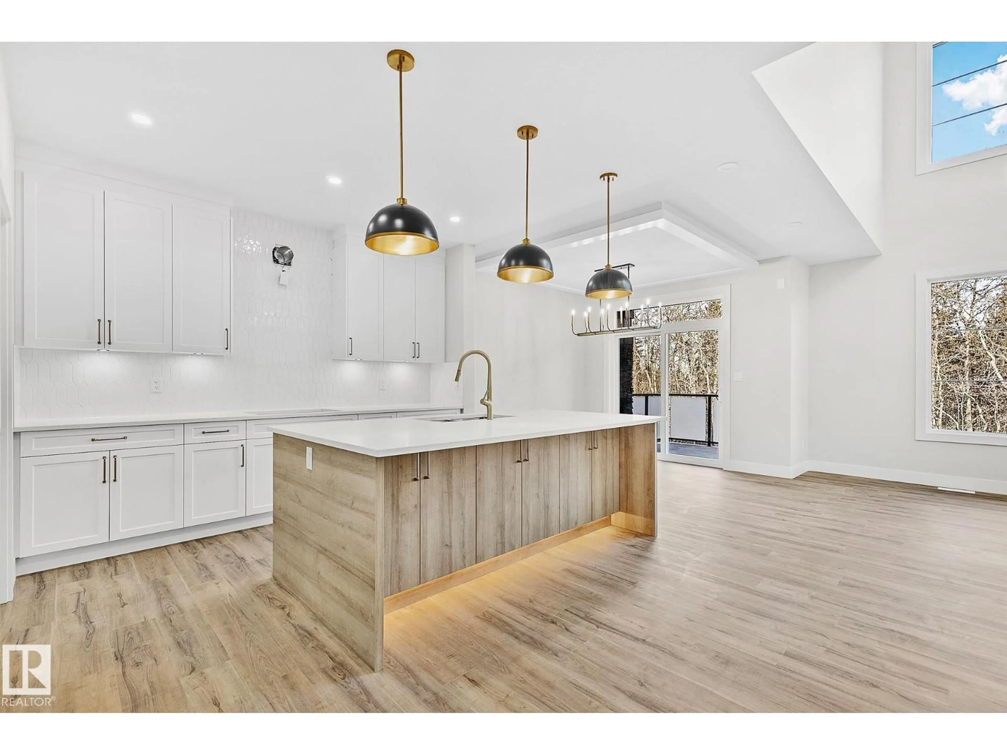 Open concept kitchen, wood/laminate floor for 6636 CRAWFORD LANDING LD, Edmonton Alberta T6W4L5