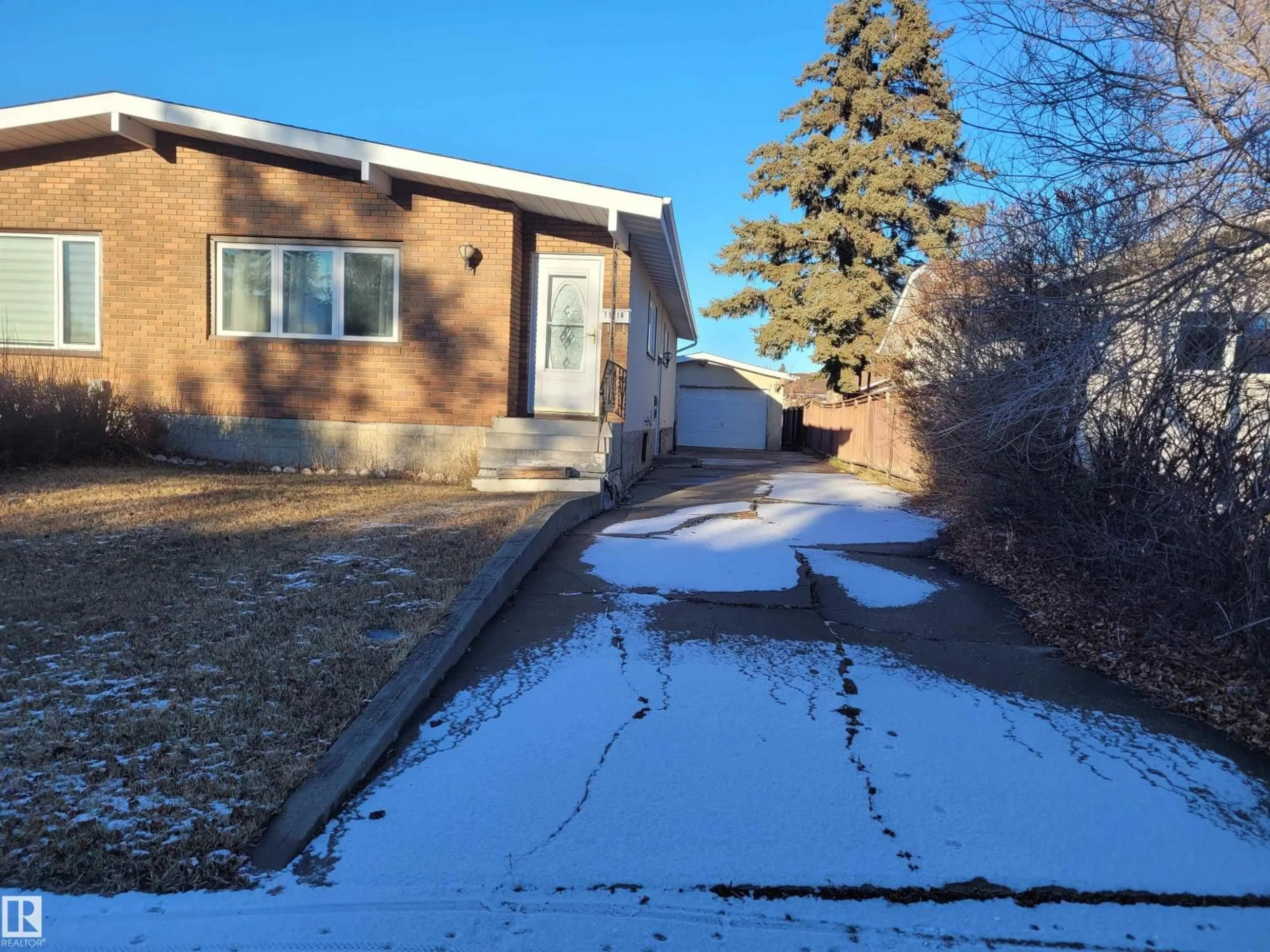A pic from outside/outdoor area/front of a property/back of a property/a pic from drone, street for 11616 152 AV, Edmonton Alberta T5X1C7