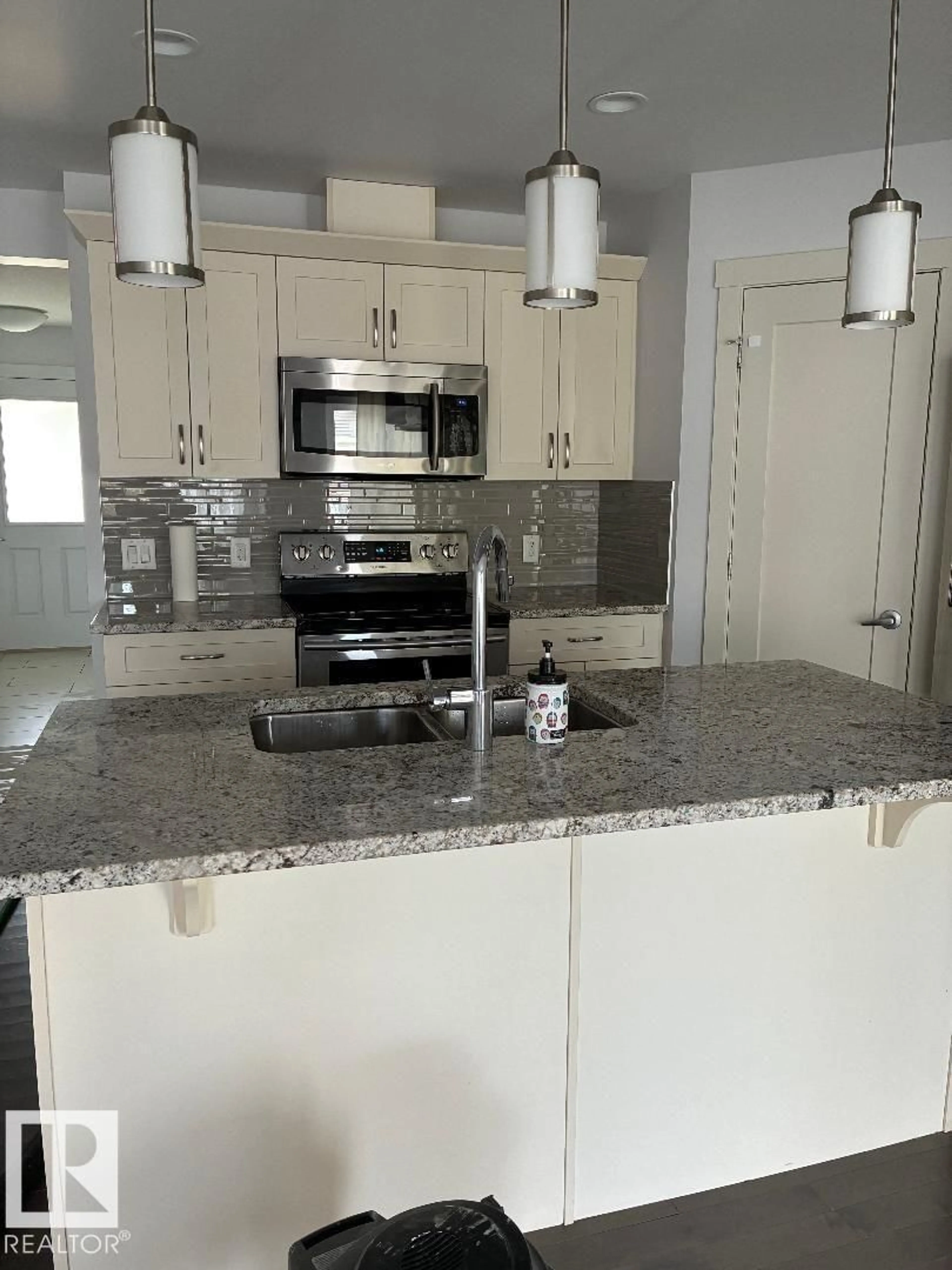 Open concept kitchen, ceramic/tile floor for 2433 GLENRIDDING BV, Edmonton Alberta T6W2W7