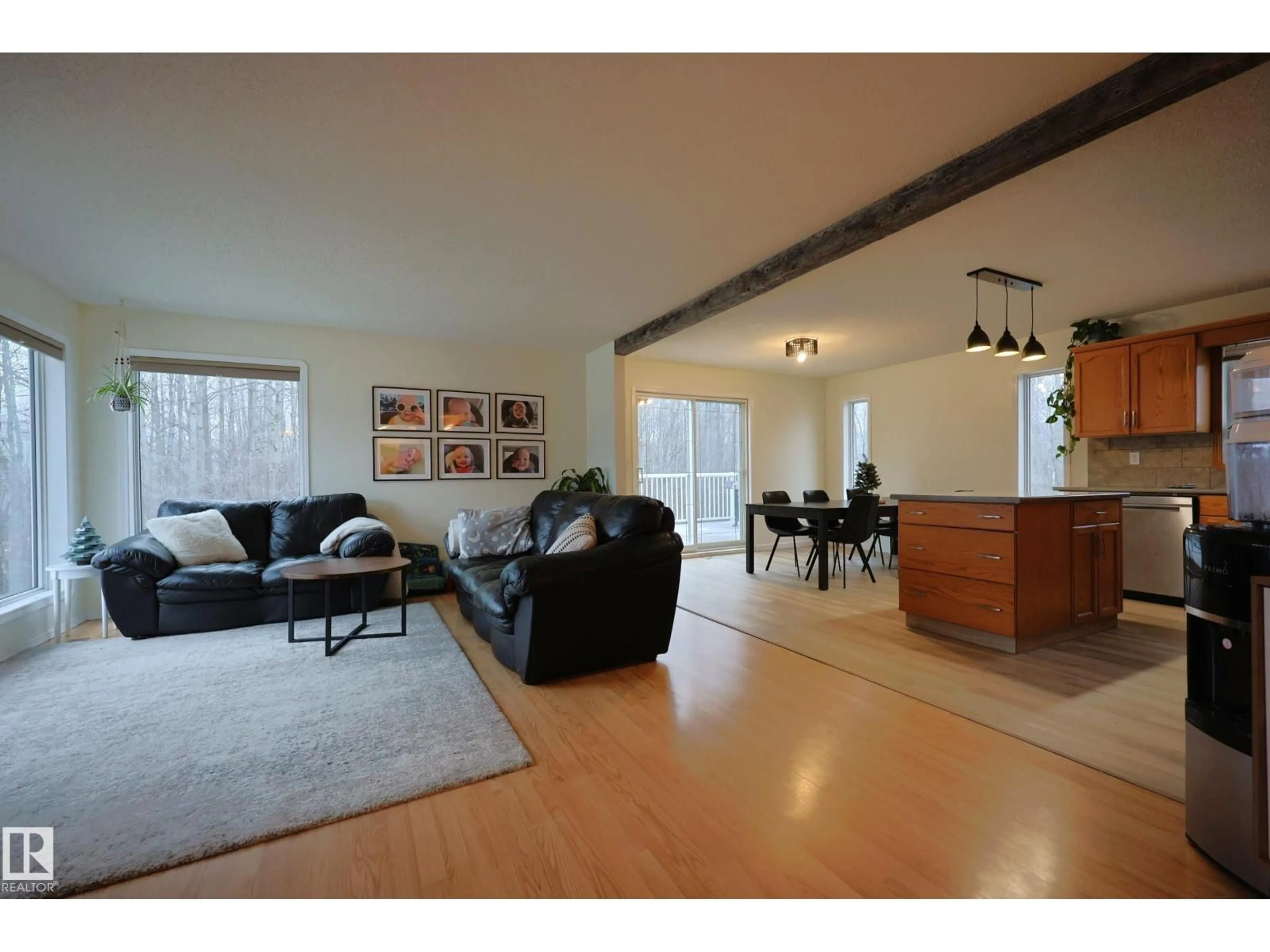 Living room with furniture, wood/laminate floor for 24 - 2228 PARKLAND DR, Rural Parkland County Alberta T0E0H0