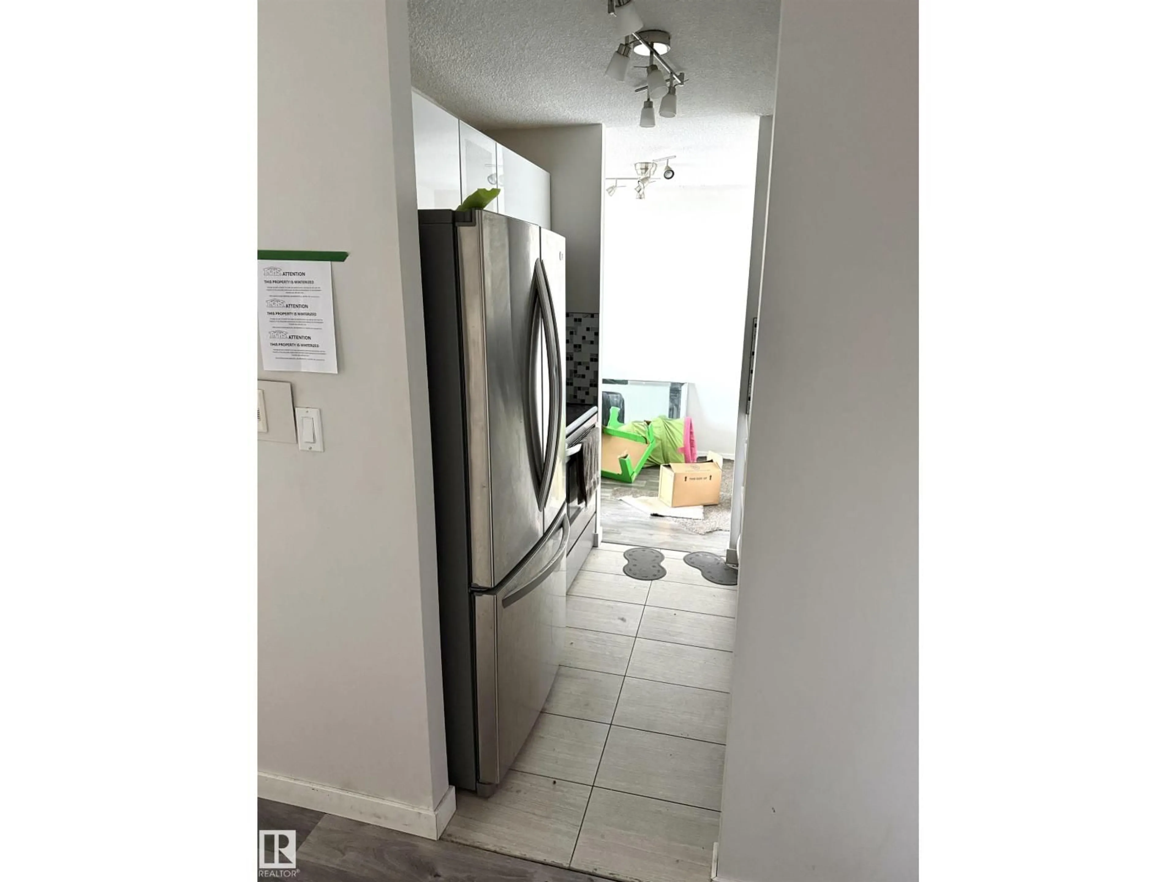 Indoor entryway for 1001 STONY PLAIN ROAD NW, Edmonton Alberta T5N3R2