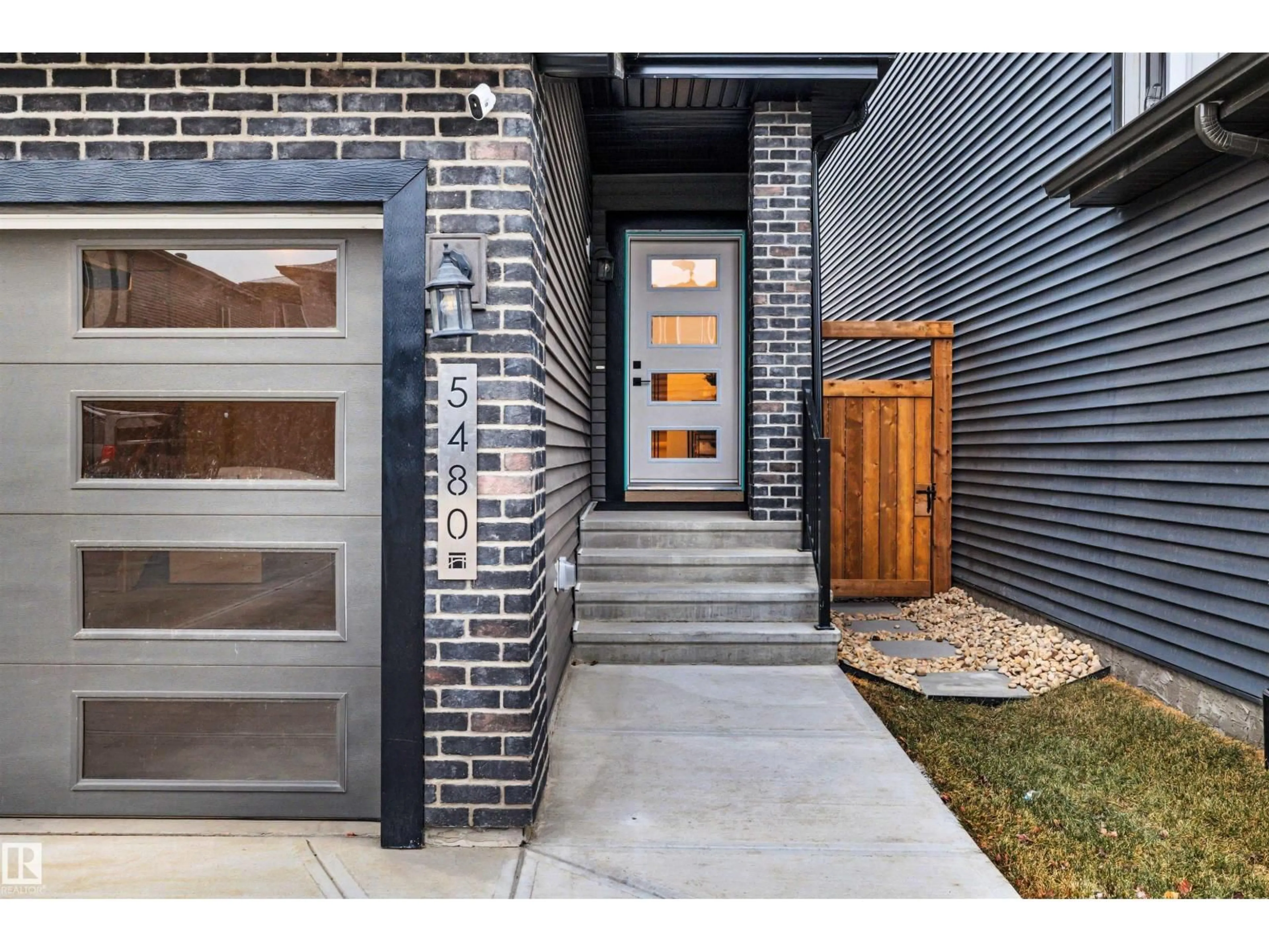Home with brick exterior material, street for 5480 KOOTOOK RD, Edmonton Alberta T6W2Z5