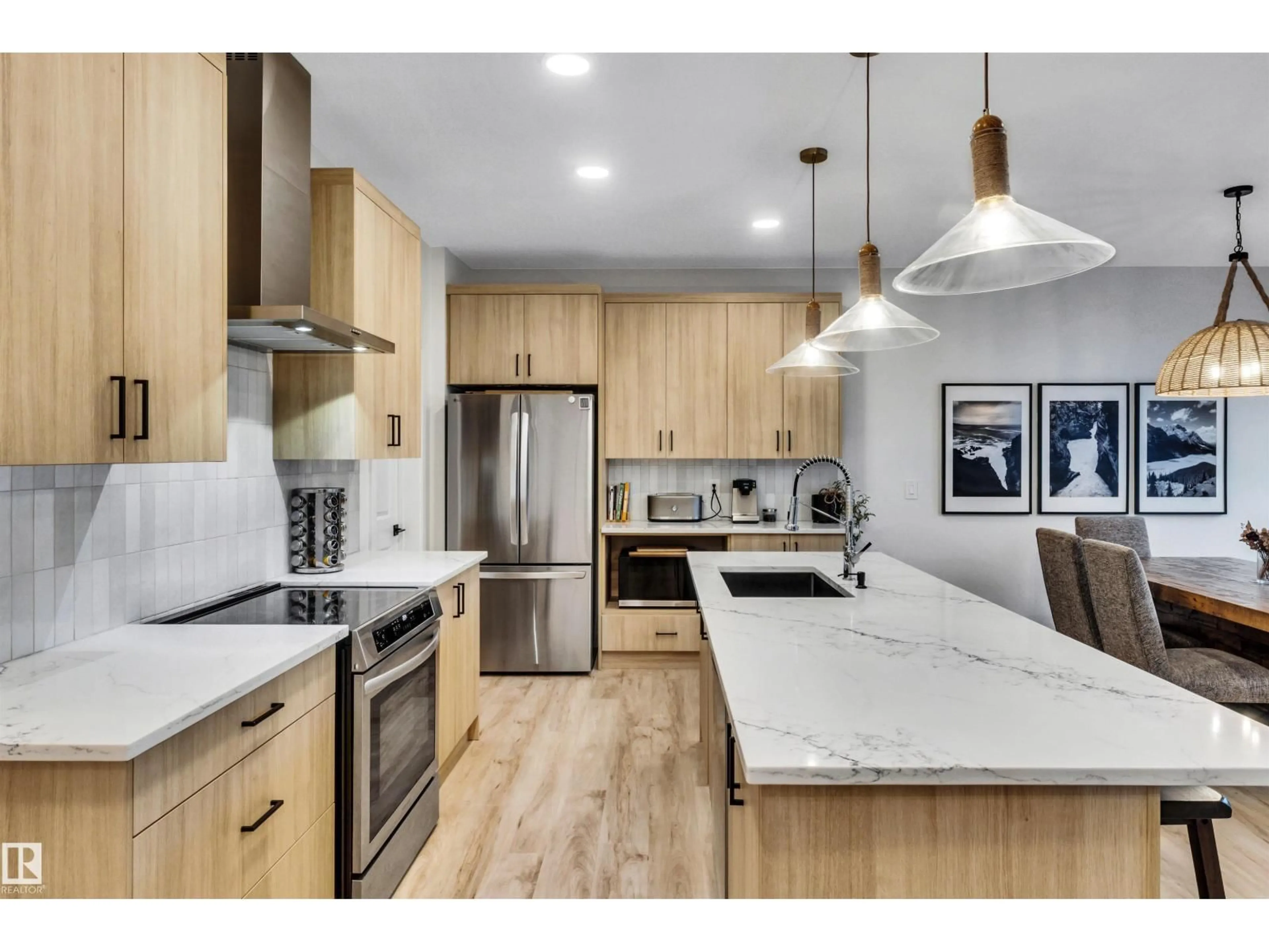 Open concept kitchen, wood/laminate floor for 5480 KOOTOOK RD, Edmonton Alberta T6W2Z5