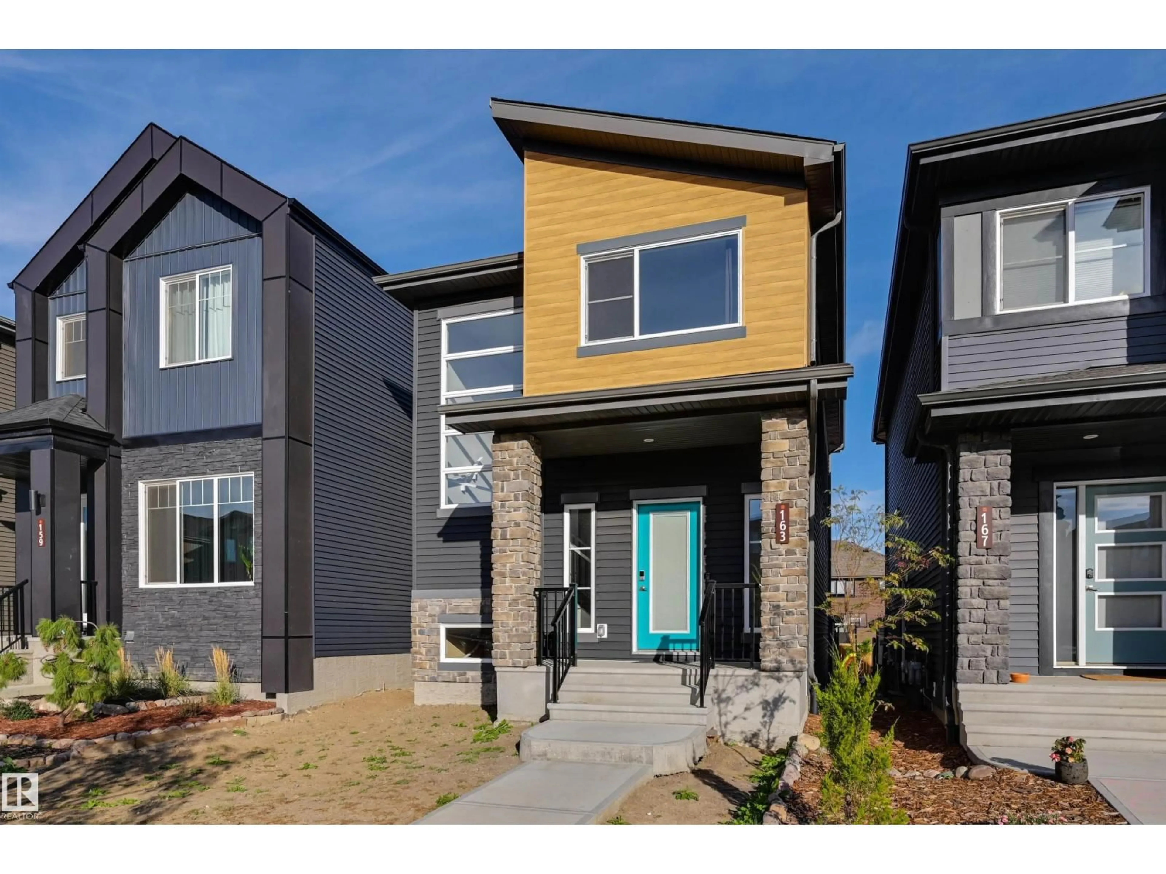 Home with vinyl exterior material, street for 163 CANTER WD, Sherwood Park Alberta T8H2Z4