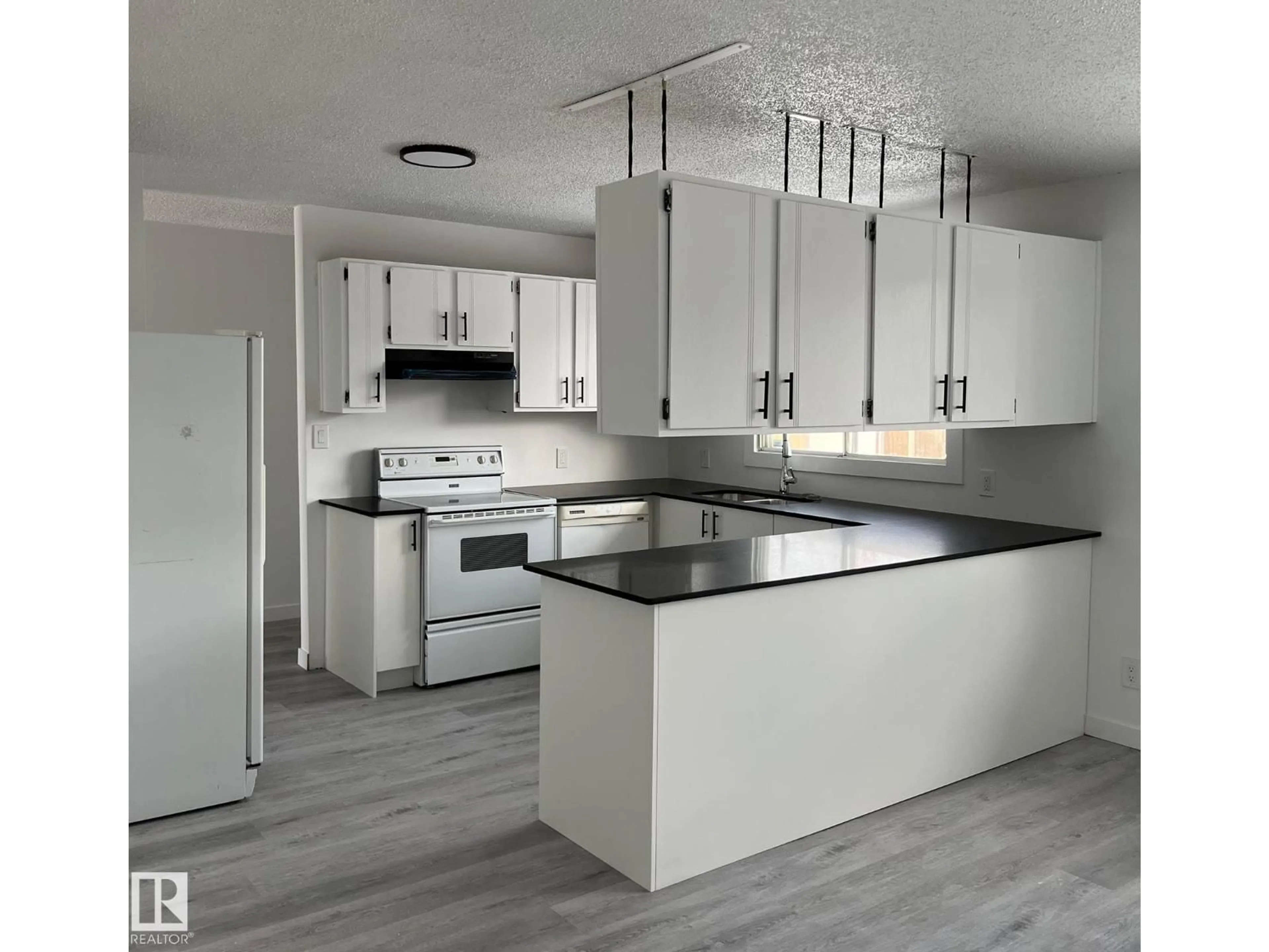 Open concept kitchen, unknown for 4315 42 ST, Bonnyville Town Alberta T9N1W6