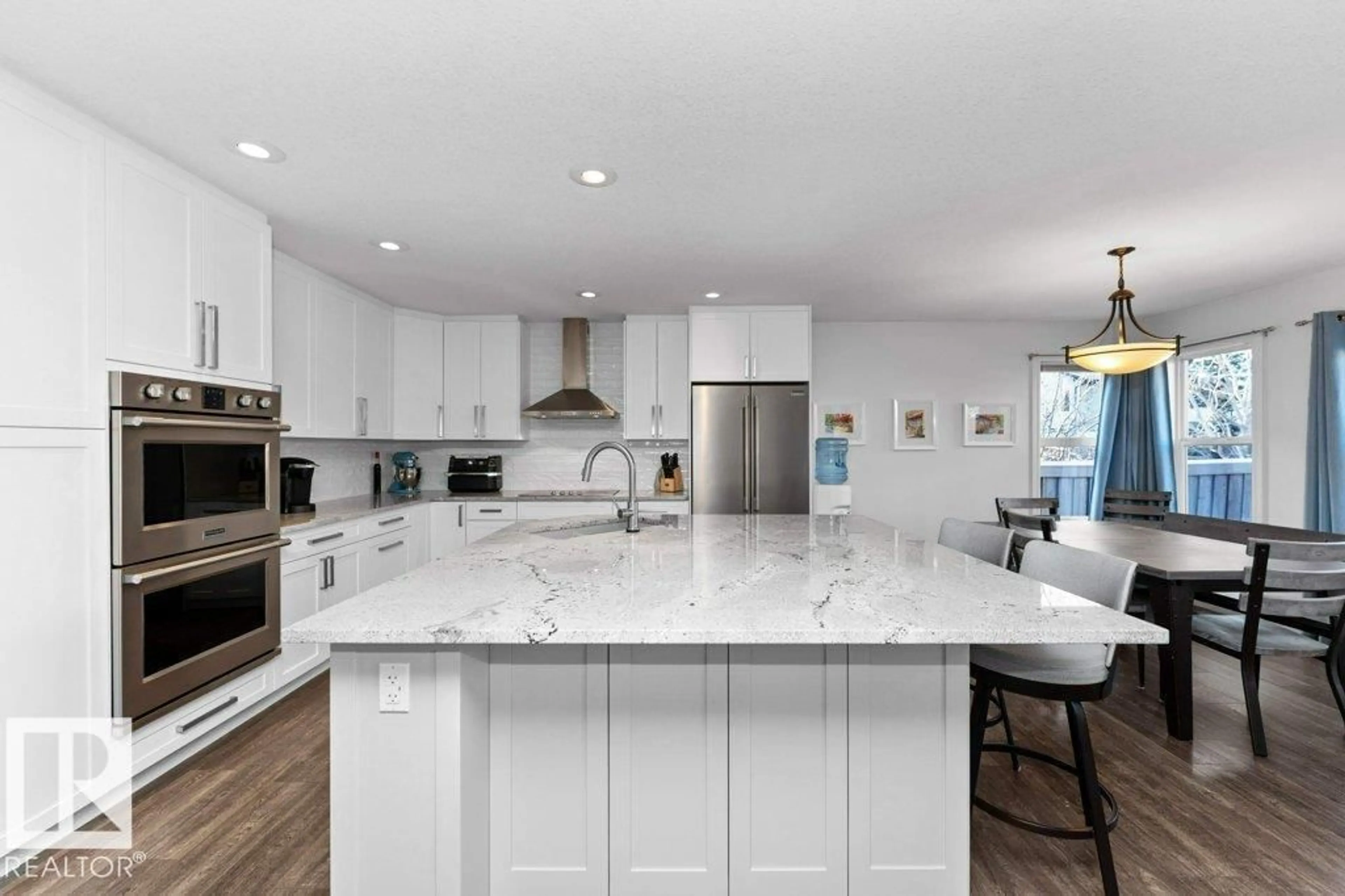 Open concept kitchen, ceramic/tile floor for 8220 SHASKE PL, Edmonton Alberta T6R3V9