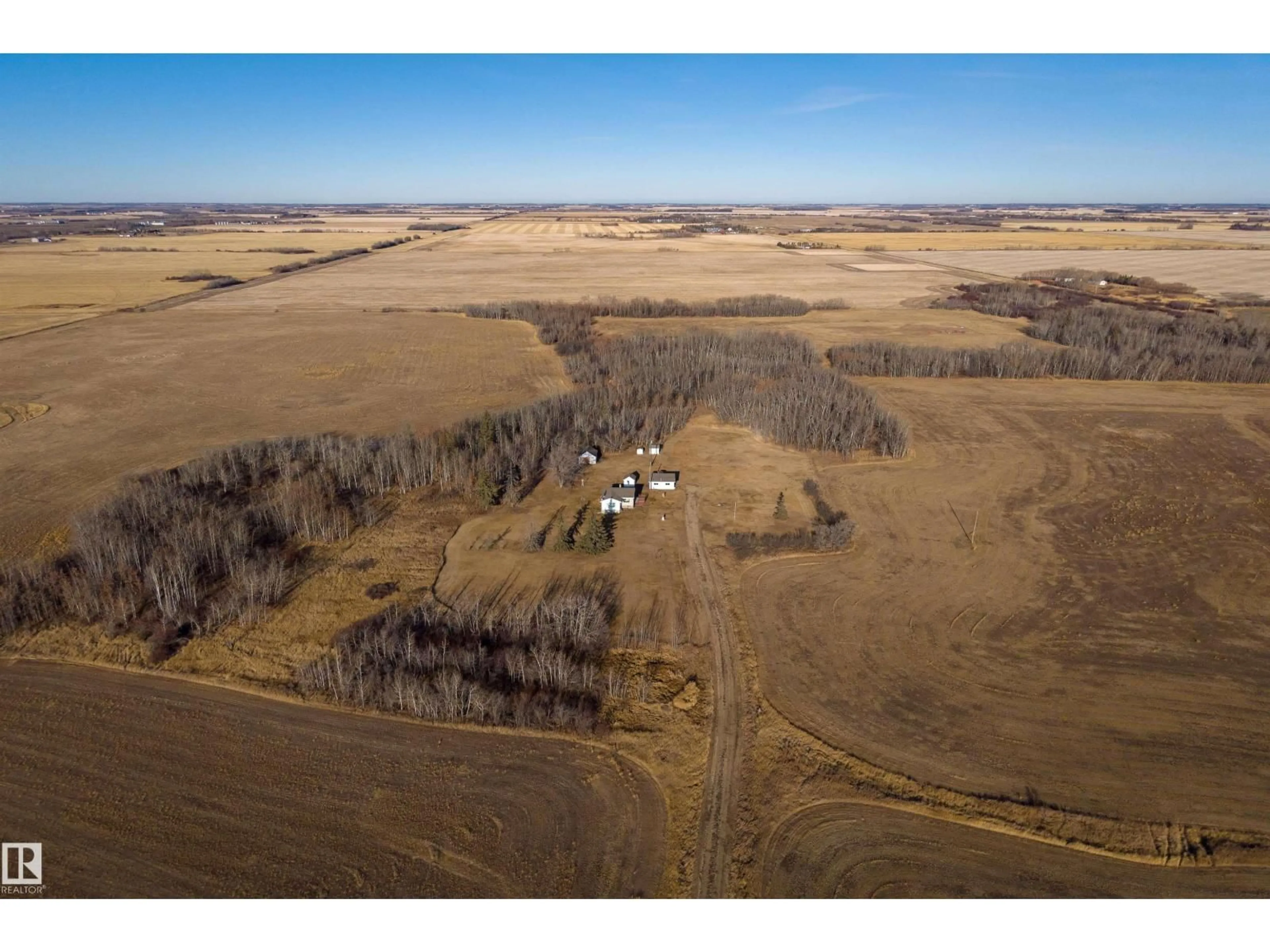 A pic from outside/outdoor area/front of a property/back of a property/a pic from drone, building for 26110 TWP ROAD 554, Rural Sturgeon County Alberta T8R0M5