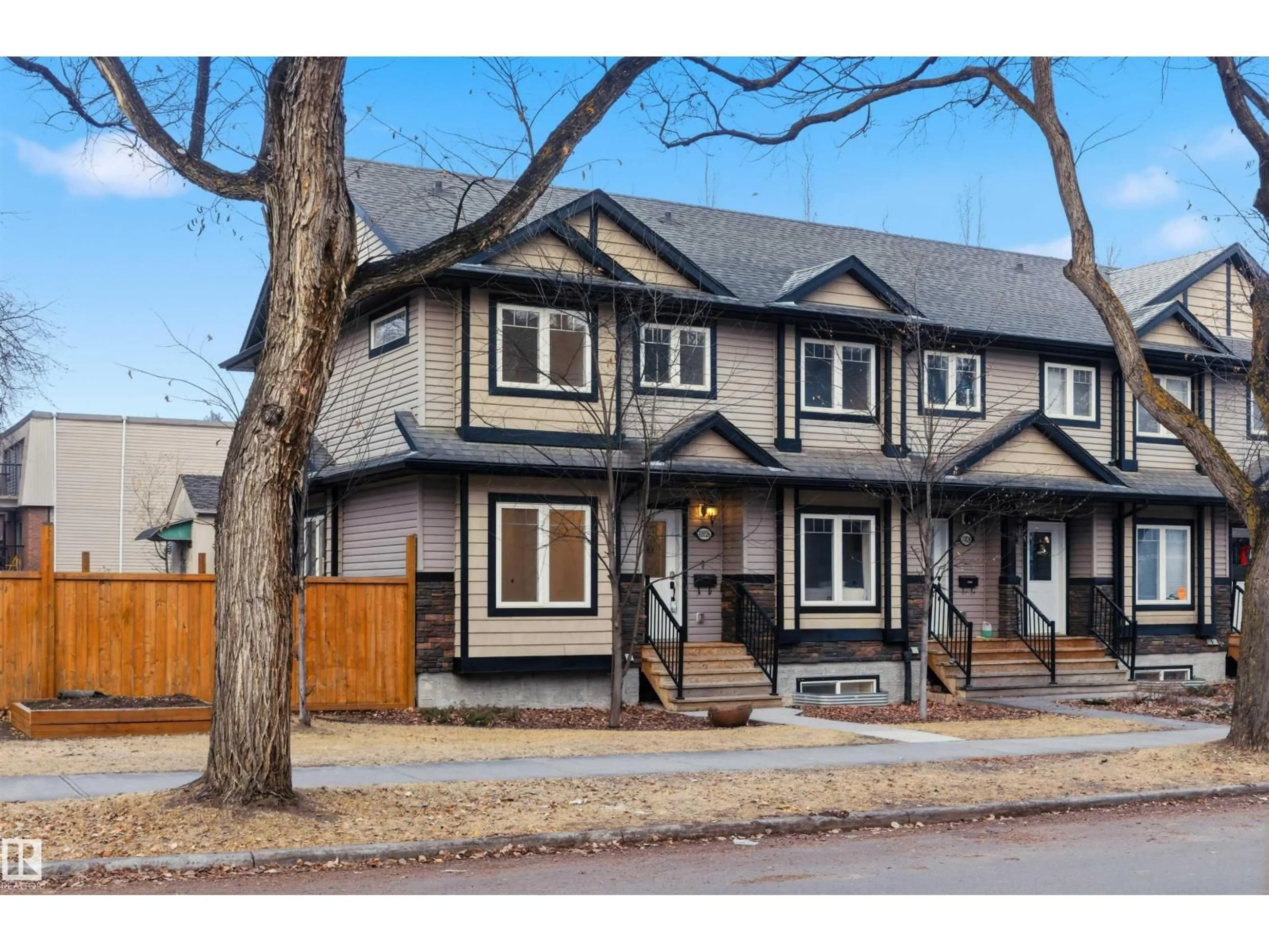 Home with vinyl exterior material, street for 11026 108 AV, Edmonton Alberta T5H3G4