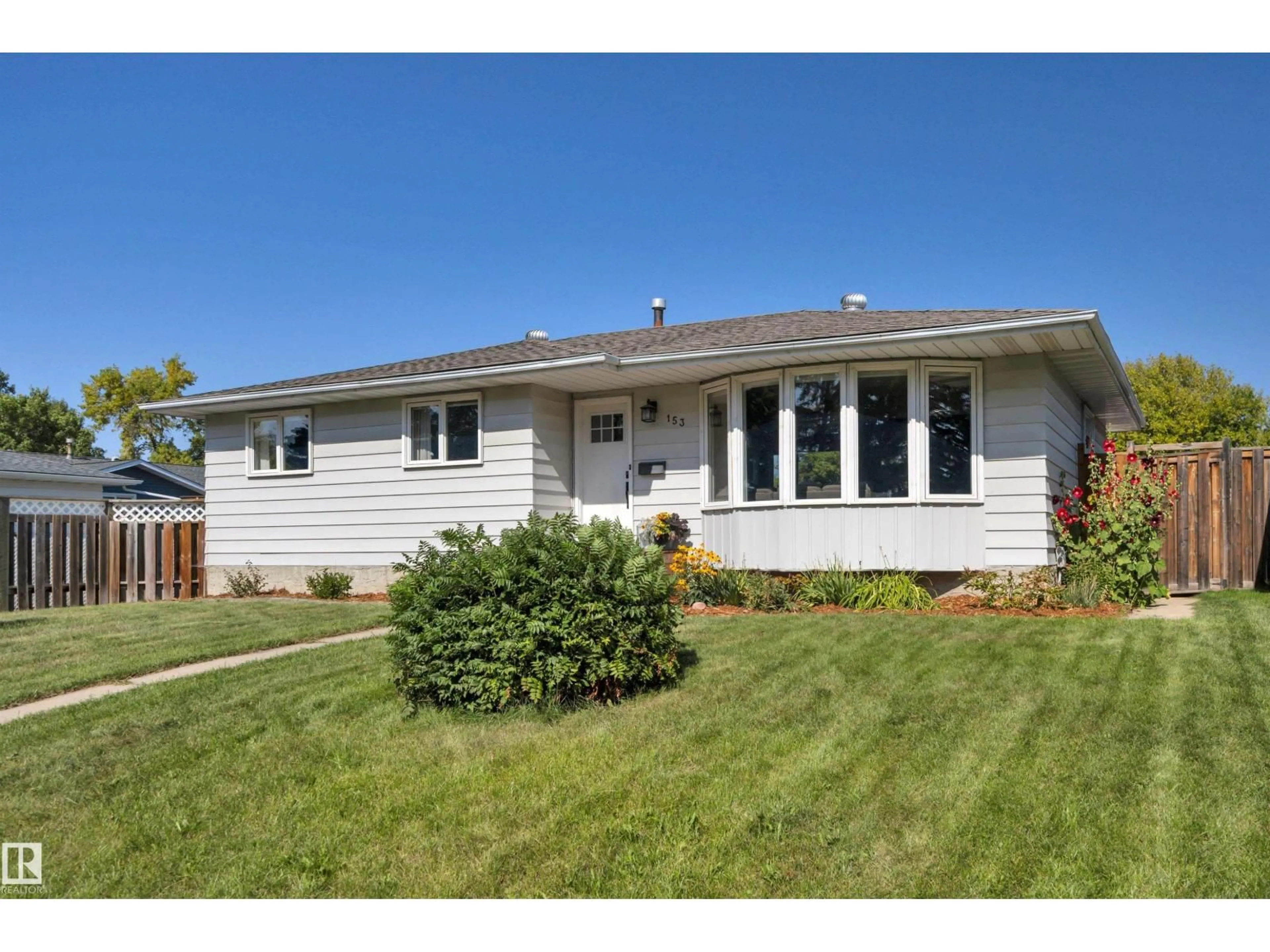 Home with vinyl exterior material, street for 153 CAMELOT AV, Leduc Alberta T9E4K7