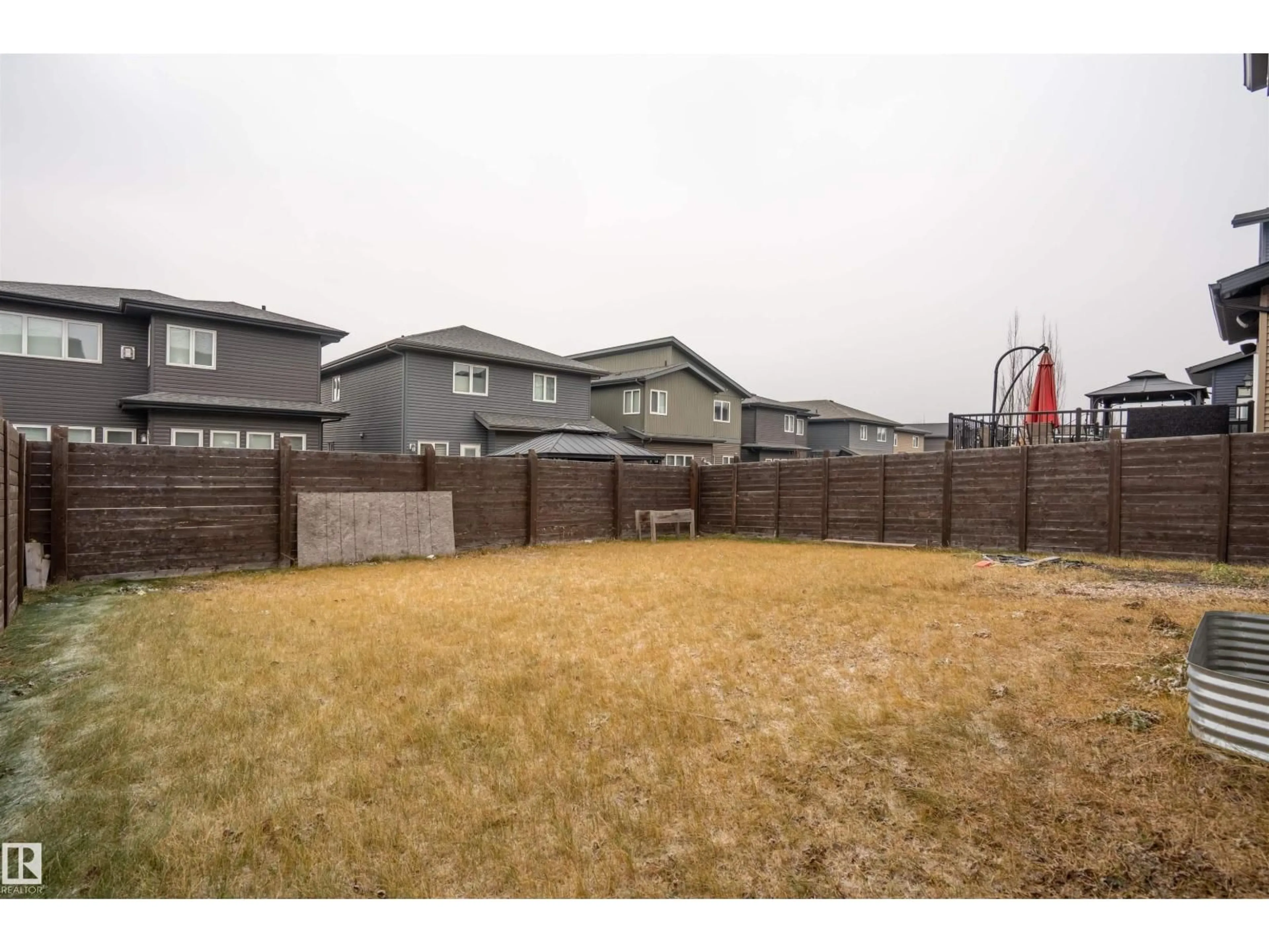 A pic from outside/outdoor area/front of a property/back of a property/a pic from drone, street for 2060 WARE RD, Edmonton Alberta T6W2W3