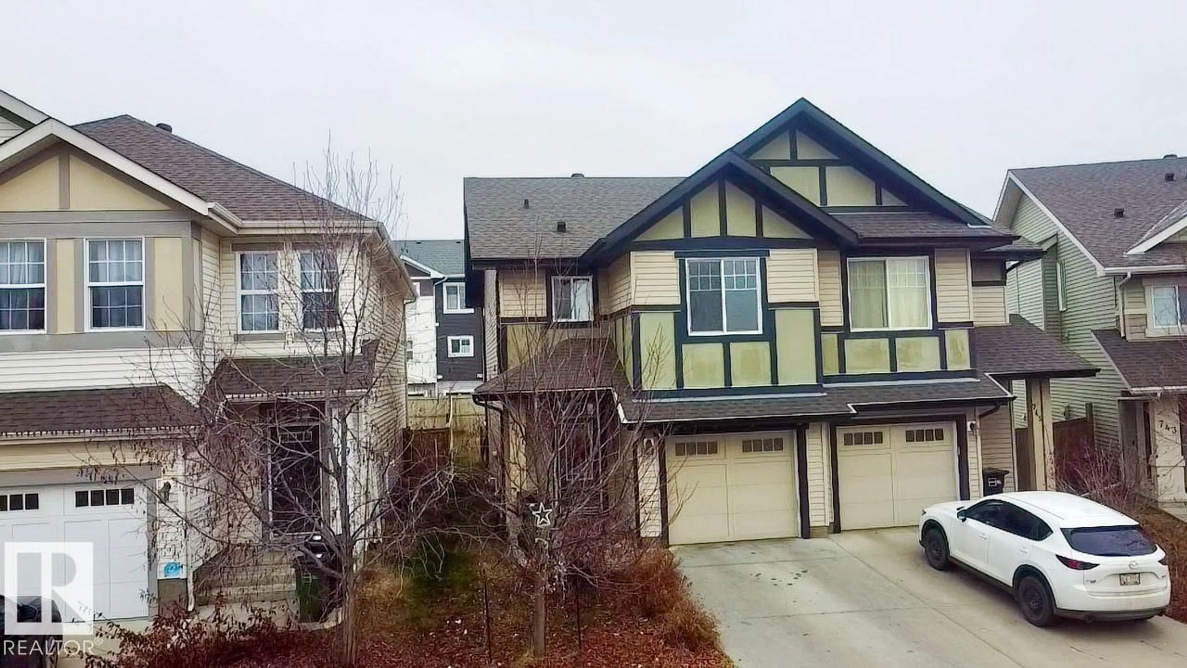 Home with vinyl exterior material, street for 747 EAGLESON CR, Edmonton Alberta T6M0T8