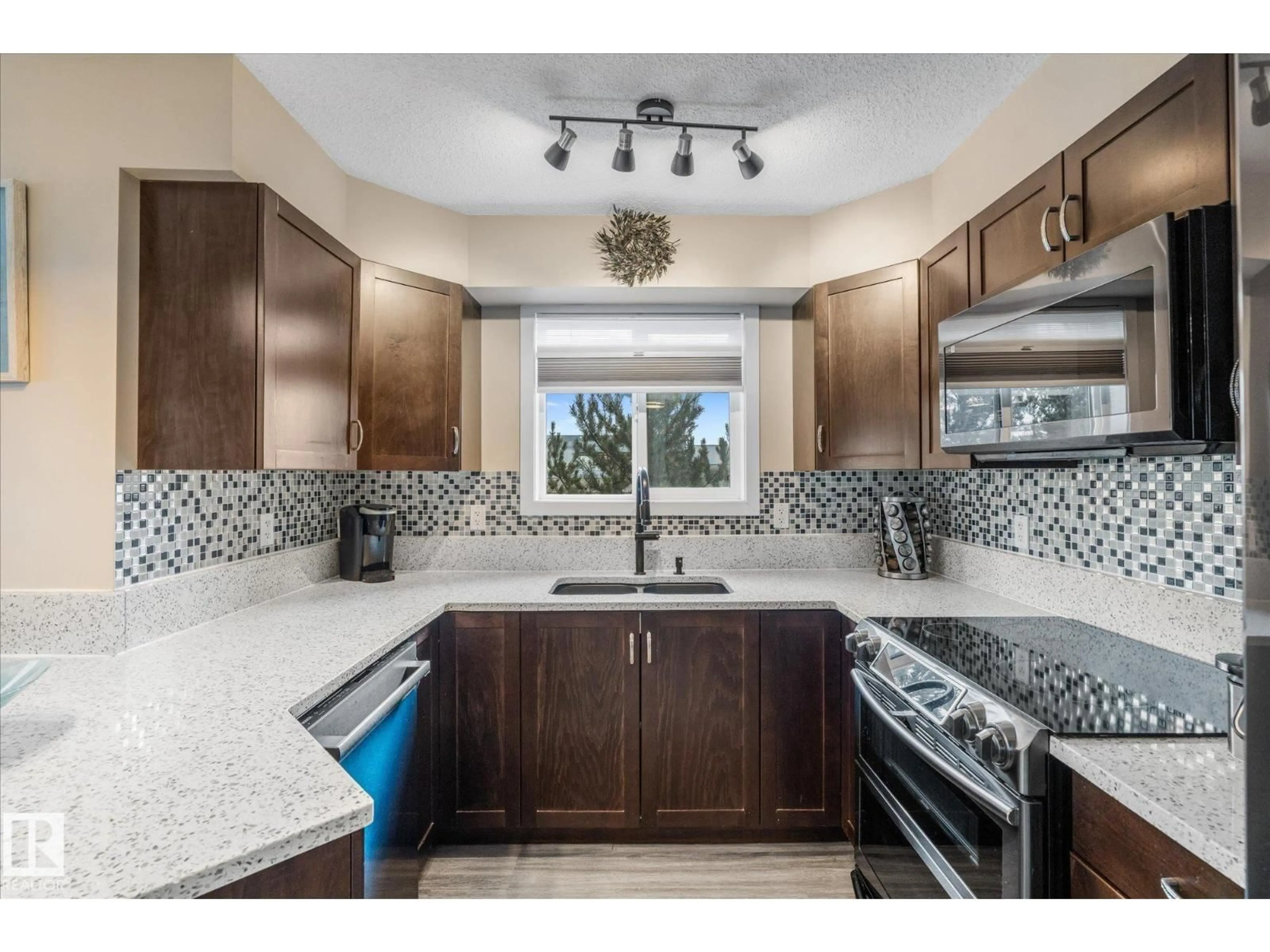 Open concept kitchen, ceramic/tile floor for #303 - 396 SILVER BERRY RD, Edmonton Alberta T6T0H1