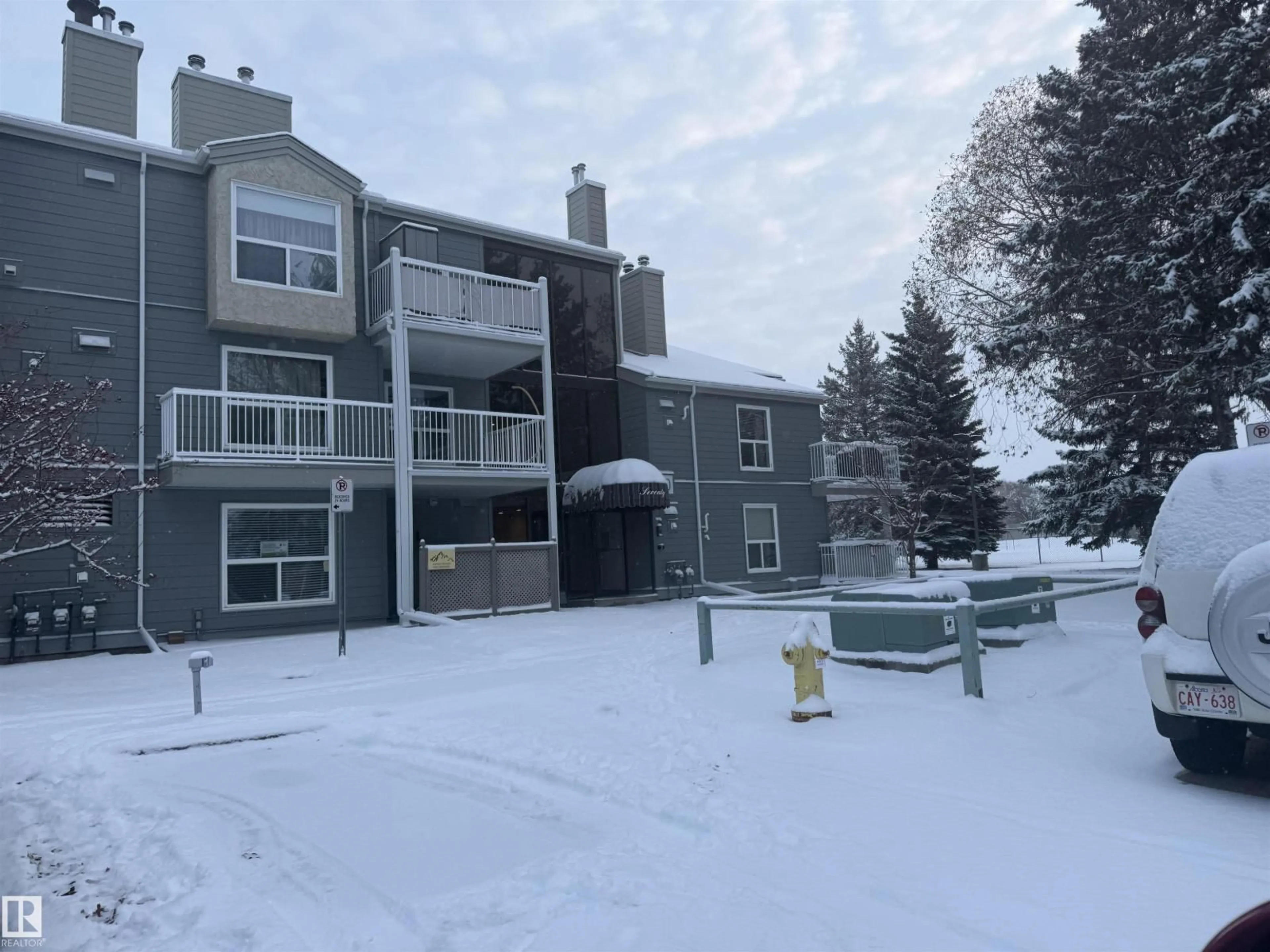 A pic from outside/outdoor area/front of a property/back of a property/a pic from drone, mountain view for #104 - 104 70 ALPINE PL, St. Albert Alberta T8N2Y2