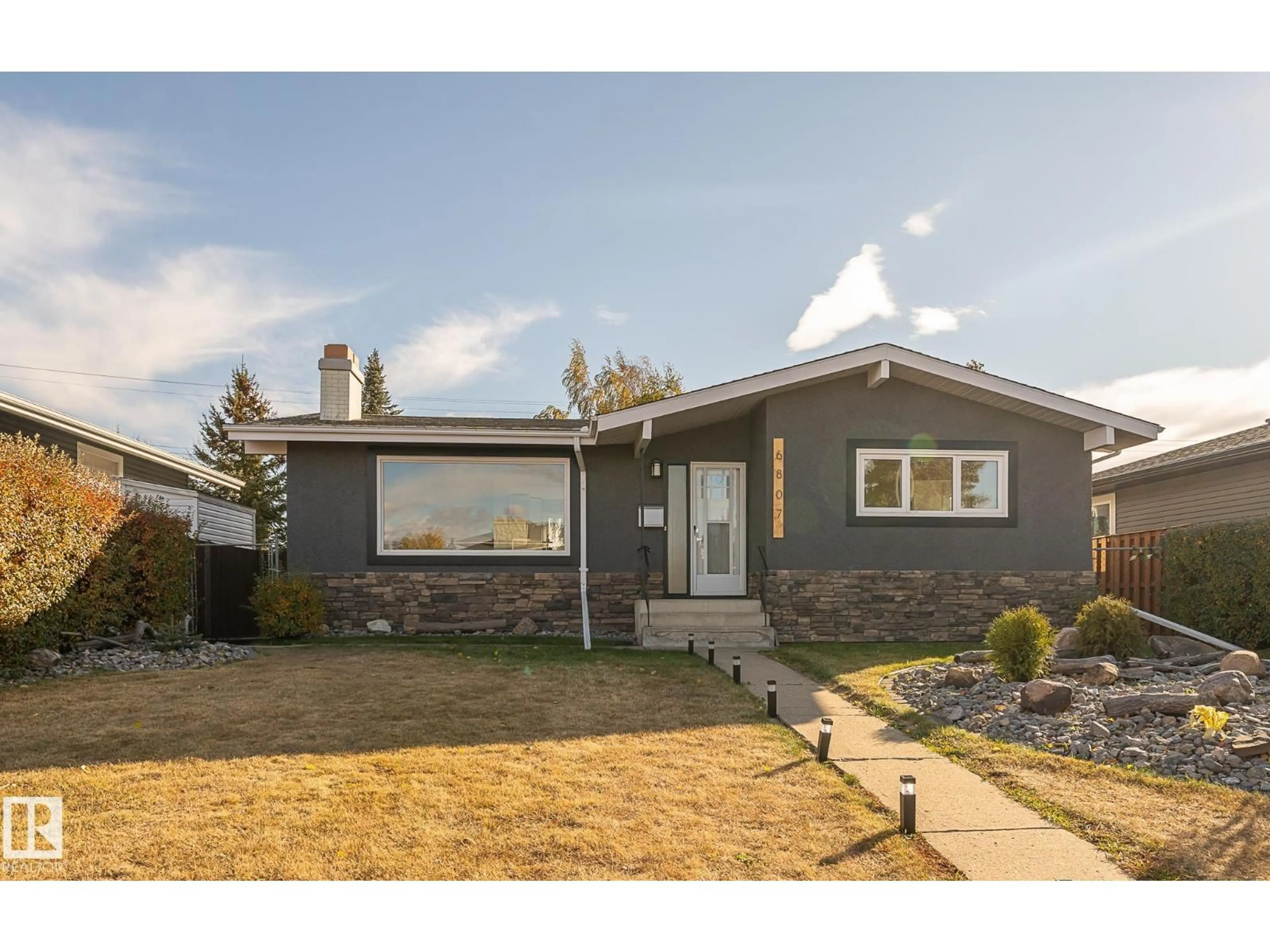 Home with vinyl exterior material, street for 6807 98A AV, Edmonton Alberta T6A0B9