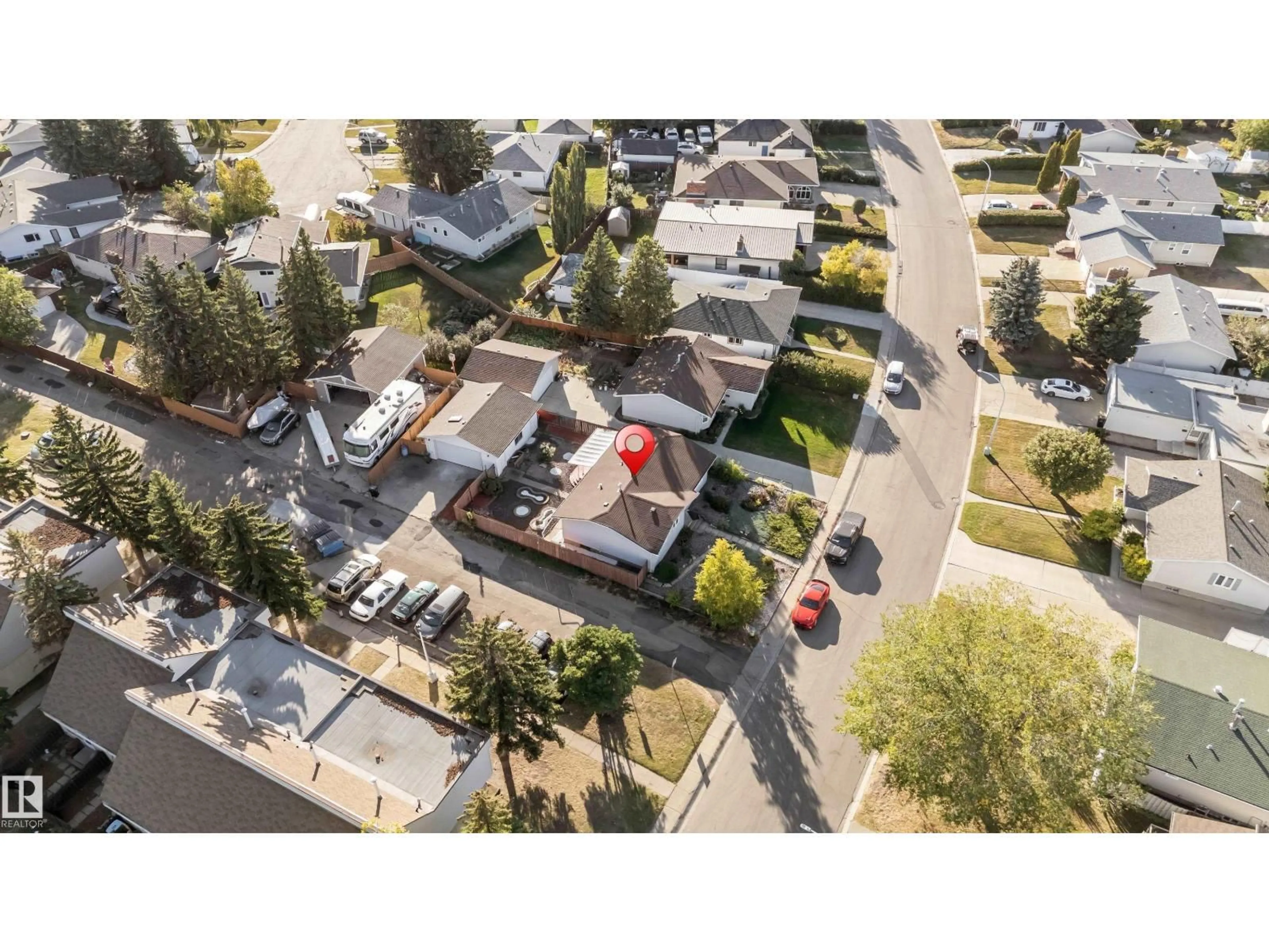 A pic from outside/outdoor area/front of a property/back of a property/a pic from drone, street for 8103 14 AV, Edmonton Alberta T6K1X3