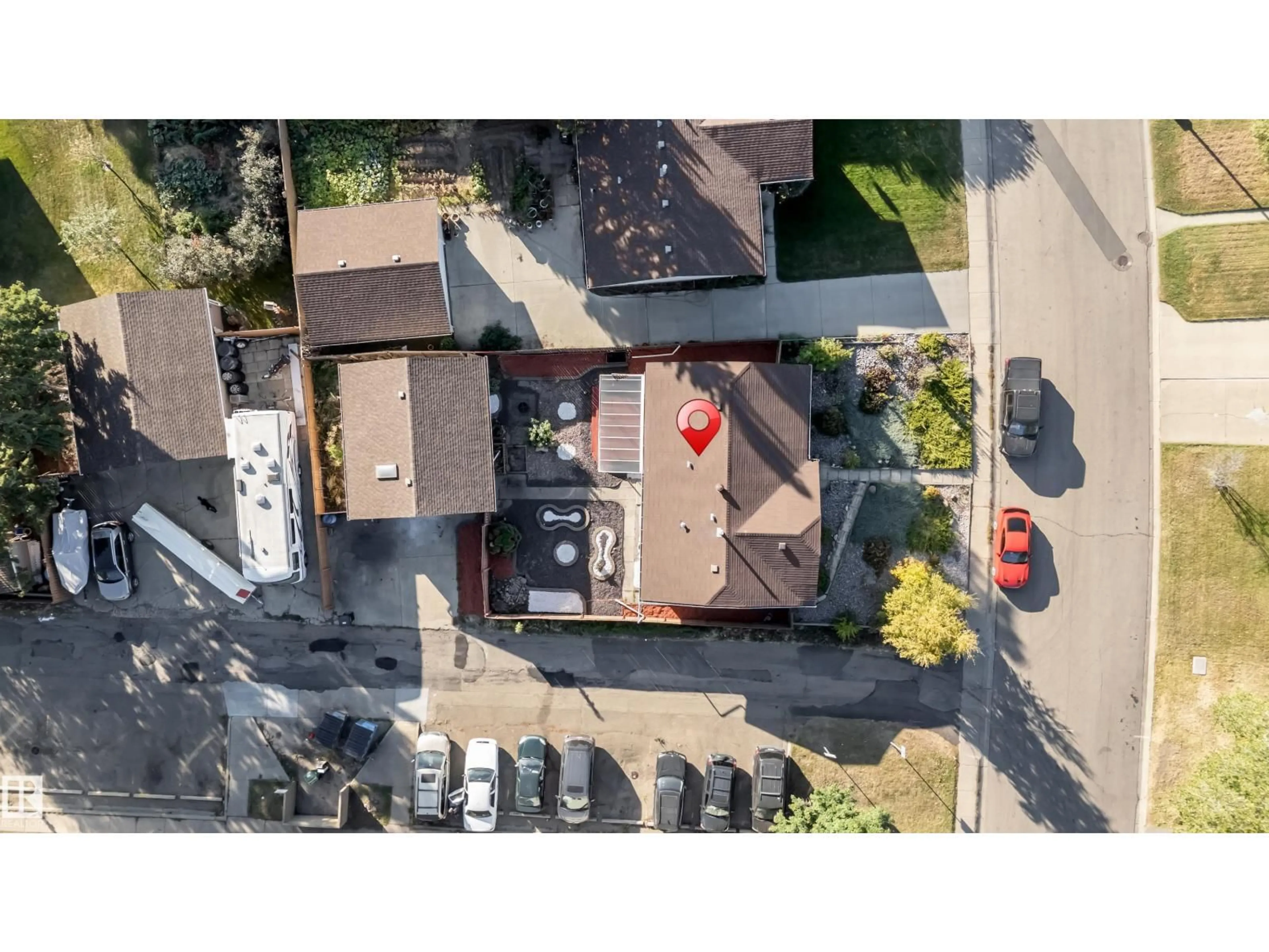 A pic from outside/outdoor area/front of a property/back of a property/a pic from drone, street for 8103 14 AV, Edmonton Alberta T6K1X3