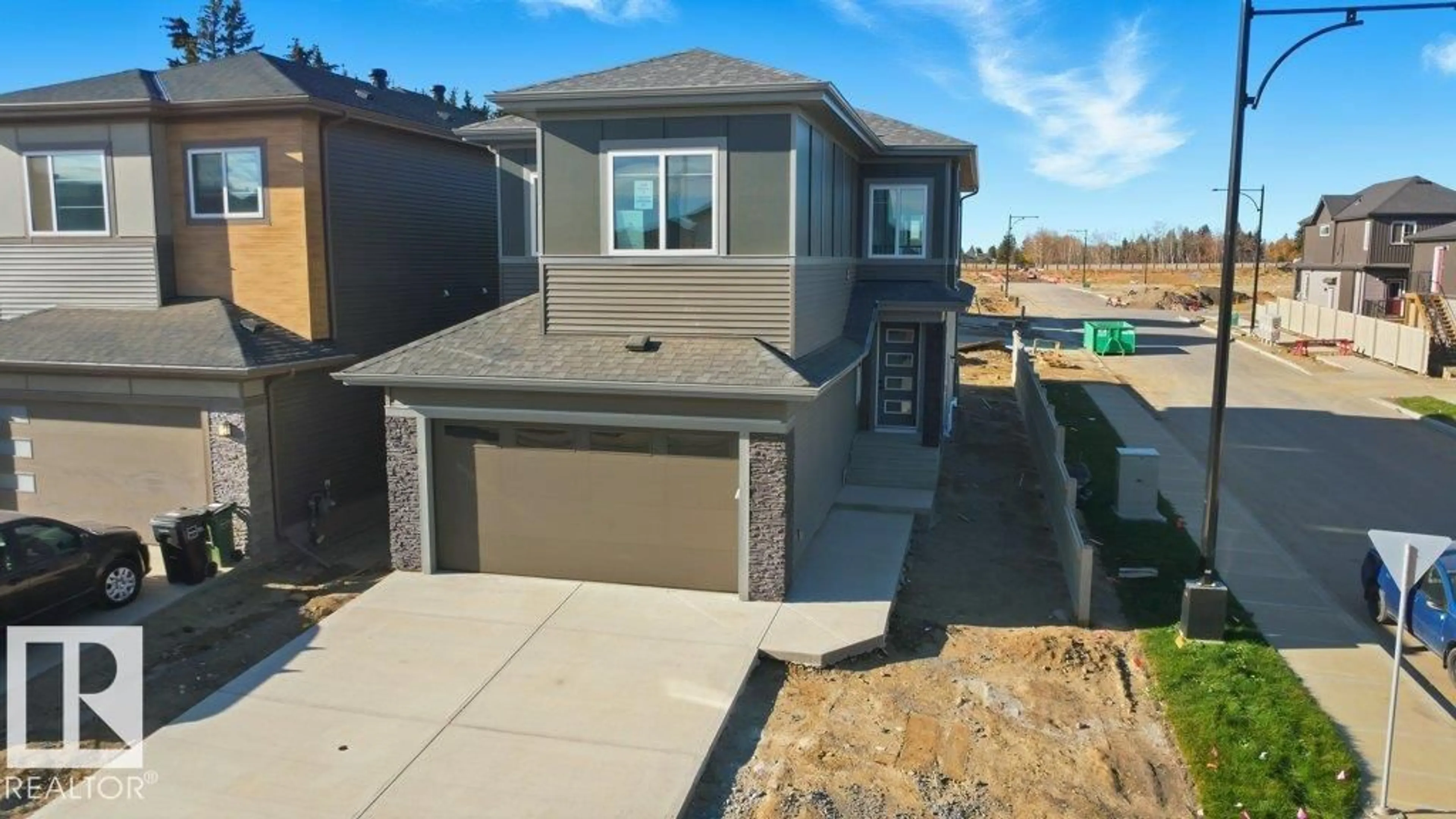 A pic from outside/outdoor area/front of a property/back of a property/a pic from drone, street for 1558 SISKIN LINK LI, Edmonton Alberta T5S0V1