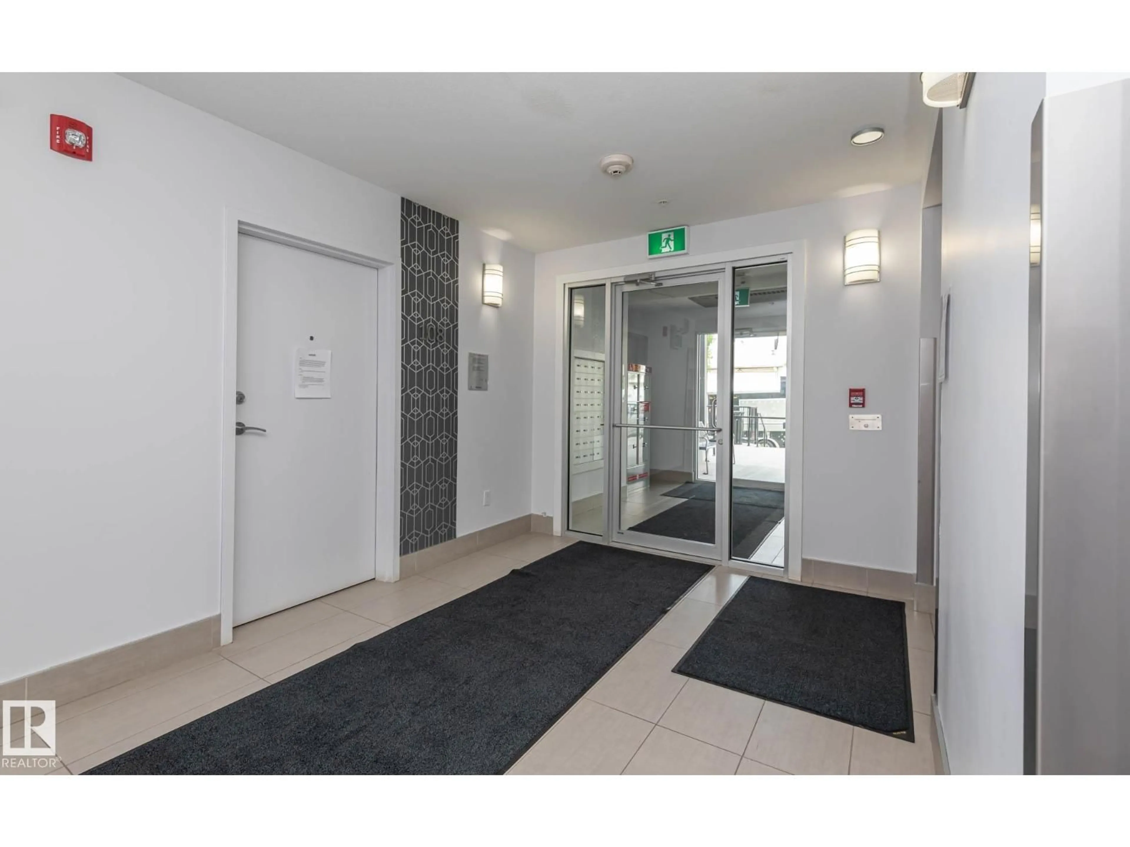 Indoor foyer for 207 8510 90 ST NW, Edmonton Alberta T6C3L5