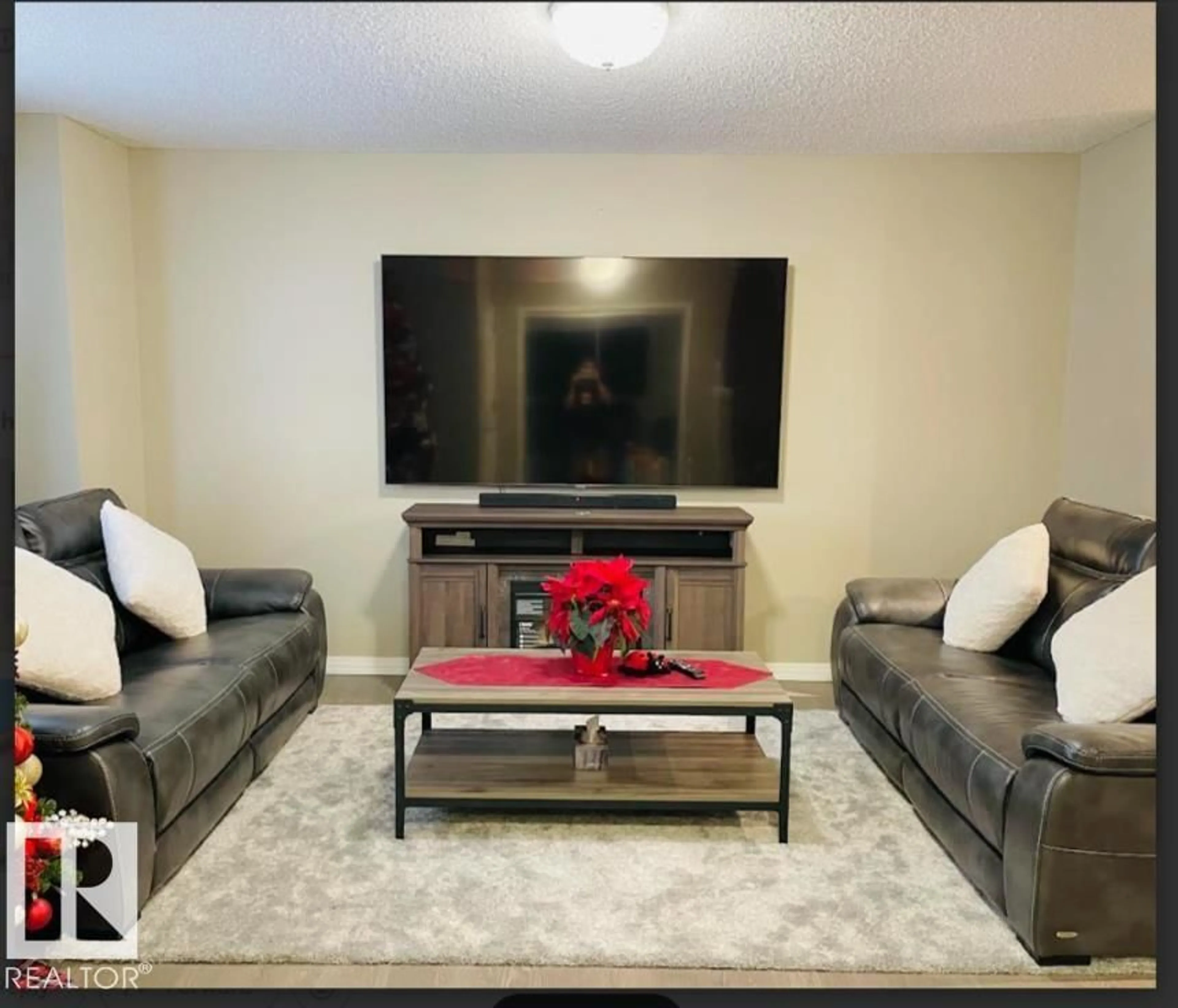 Living room with furniture, unknown for 3116 17 AV, Edmonton Alberta T6T0P7