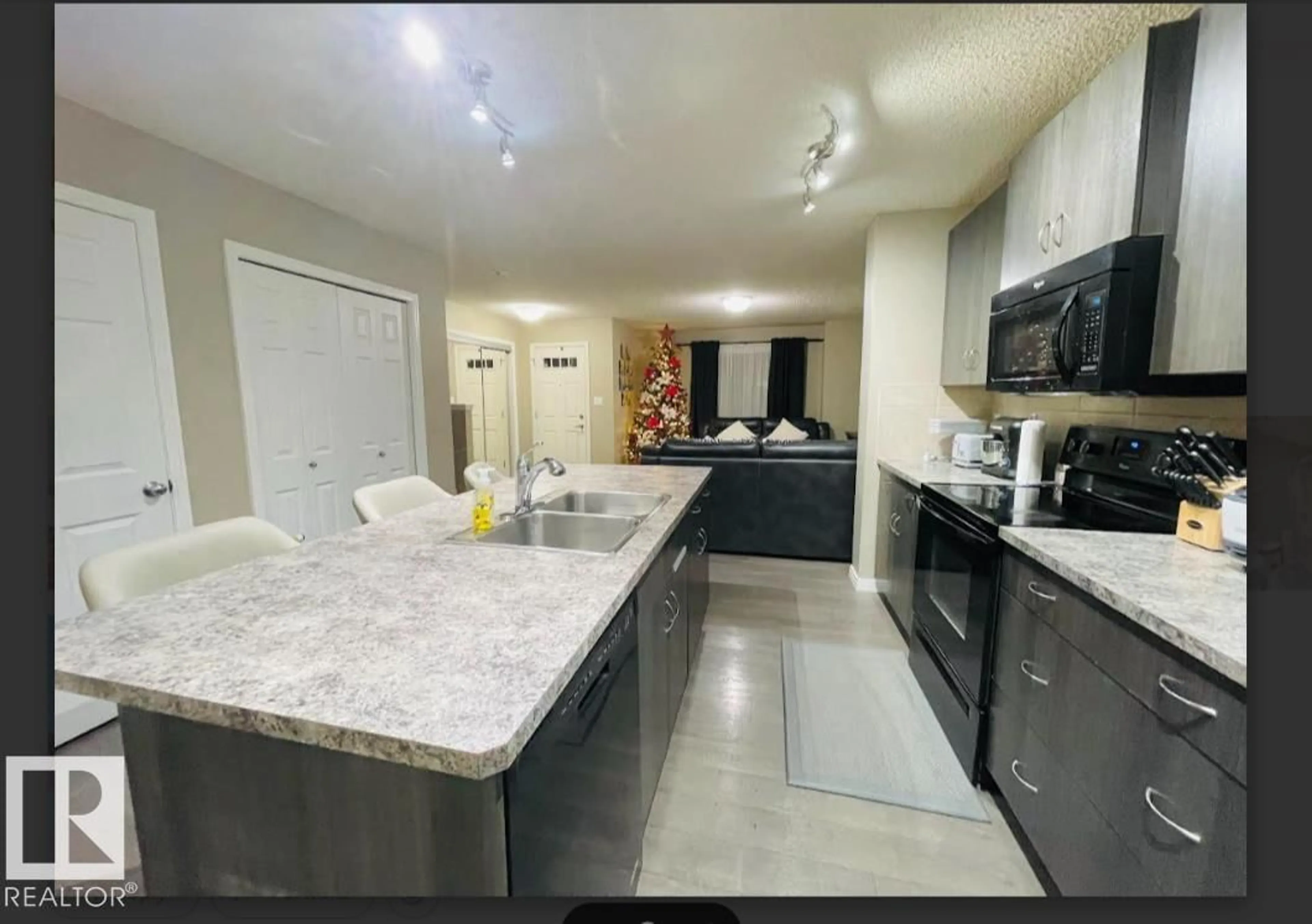 Open concept kitchen, ceramic/tile floor for 3116 17 AV, Edmonton Alberta T6T0P7