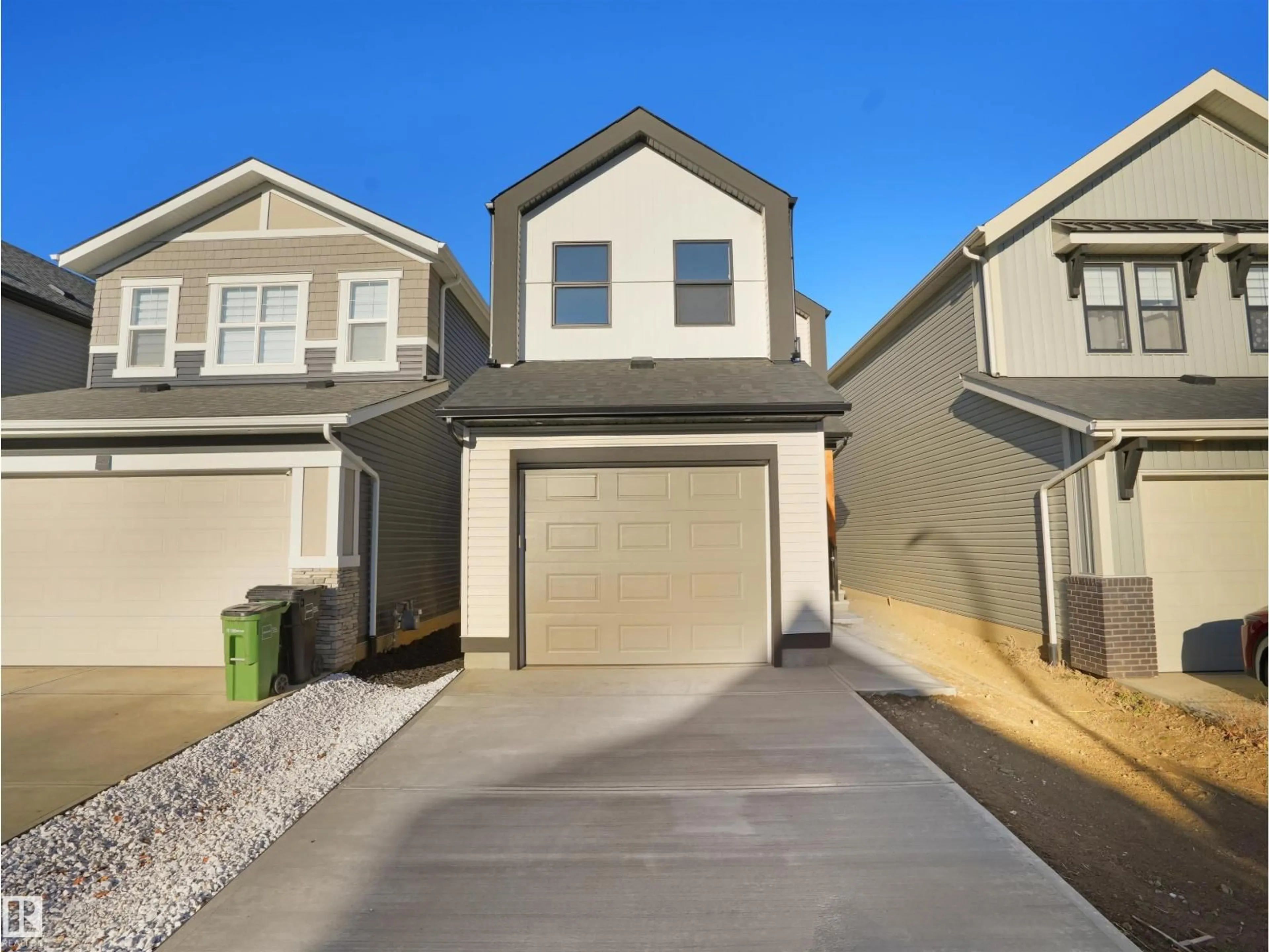 Home with vinyl exterior material, street for 22830 95A AV, Edmonton Alberta T5T7H5