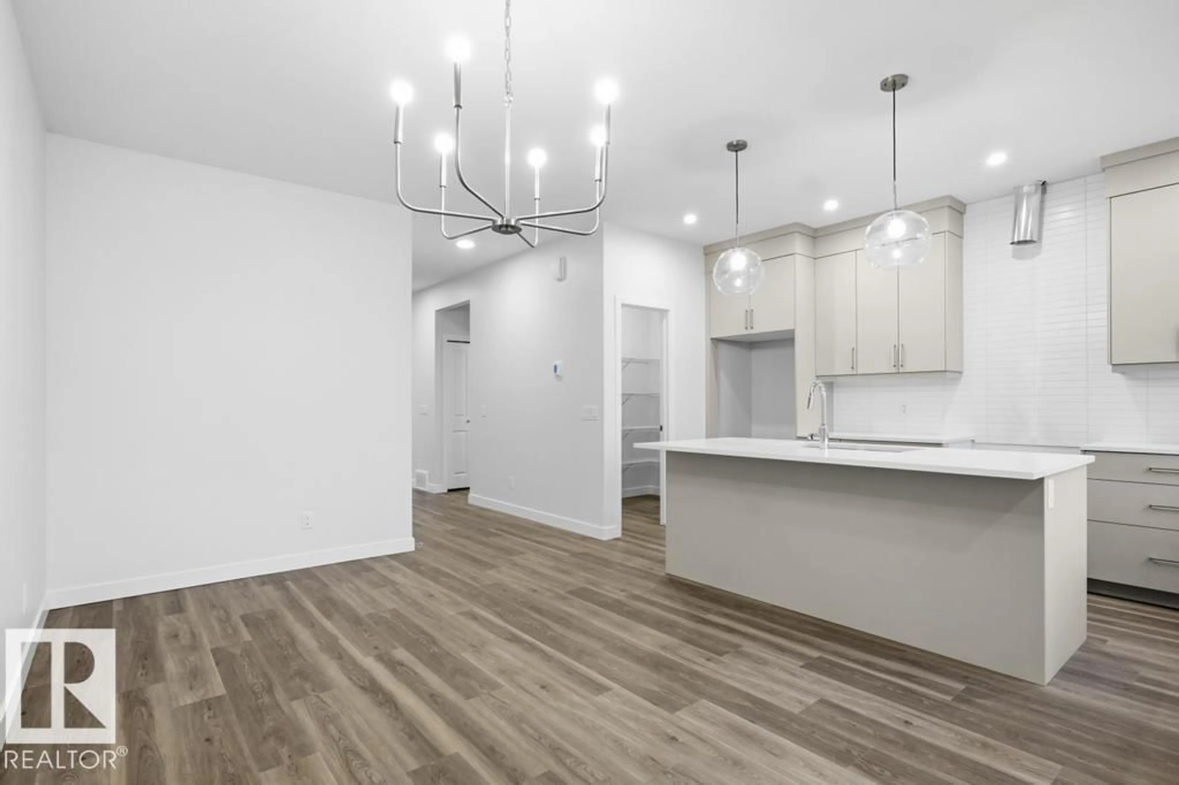 Open concept kitchen, wood/laminate floor for 3759 ERLANGER DR, Edmonton Alberta T6M1R9