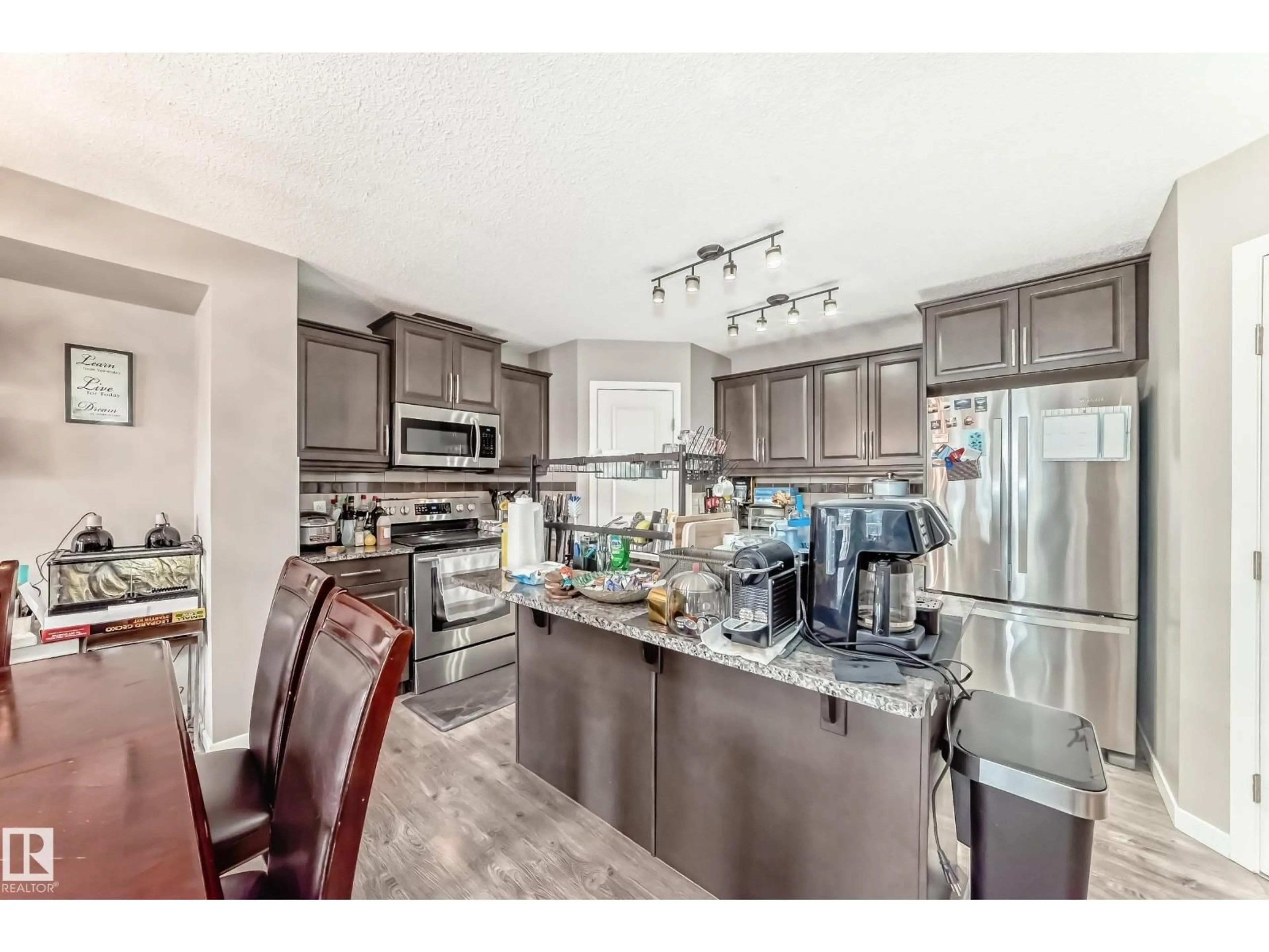 Open concept kitchen, ceramic/tile floor for 1816 - 29 RUTHERFORD RD SW, Edmonton Alberta T6W2K6