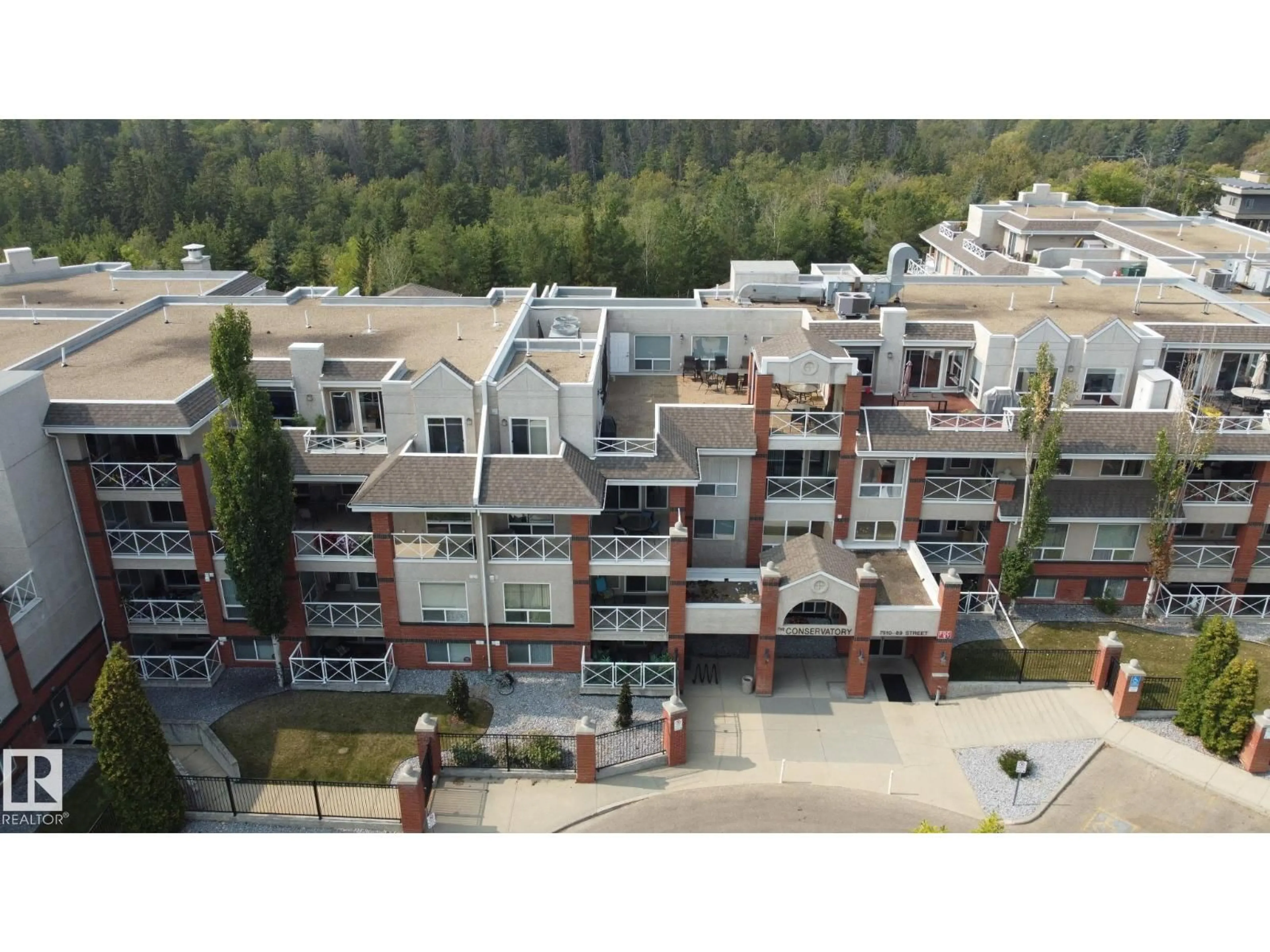 A pic from outside/outdoor area/front of a property/back of a property/a pic from drone, building for #325 - 7510 89 ST, Edmonton Alberta T6C0X5