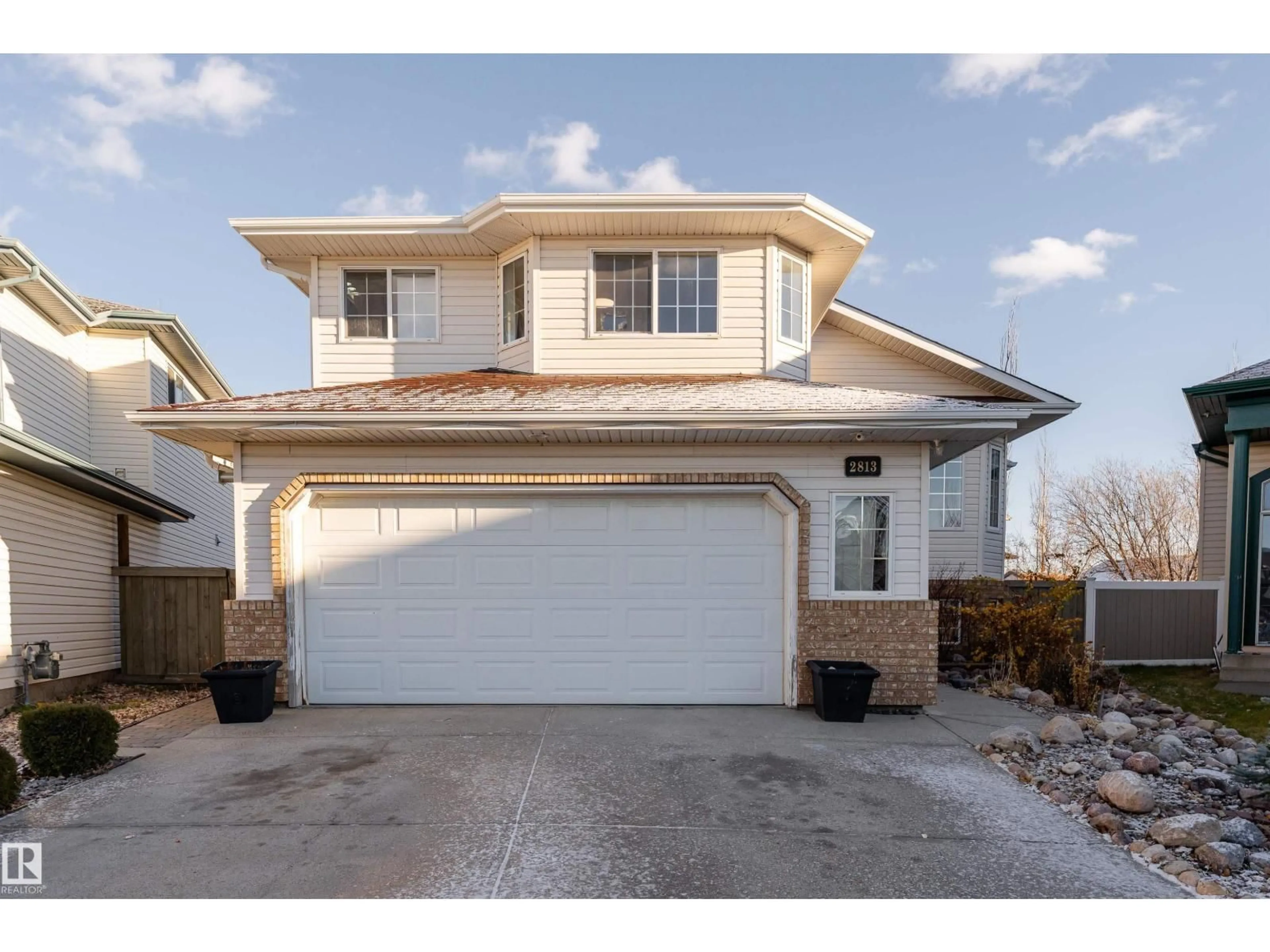 Home with vinyl exterior material, street for NW - 2813 32A ST, Edmonton Alberta T6T0M5