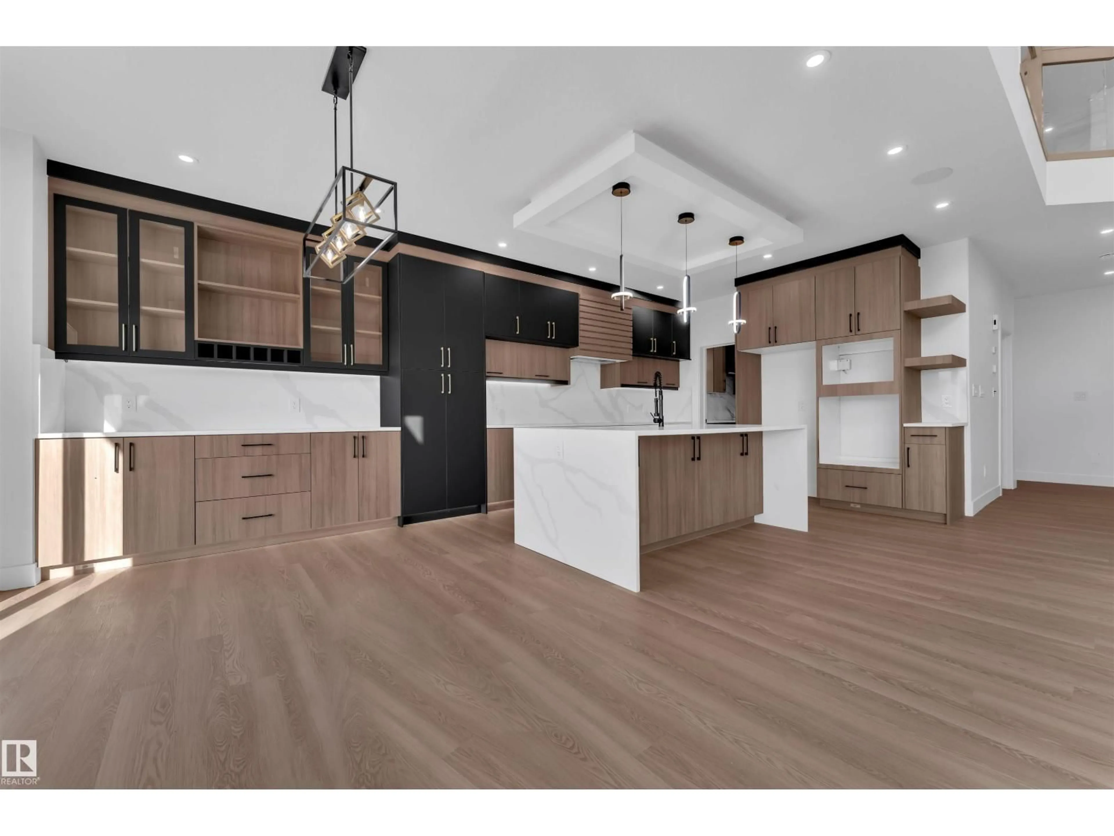 Open concept kitchen, wood/laminate floor for 176 CALEDON CR, Spruce Grove Alberta T7X4E3