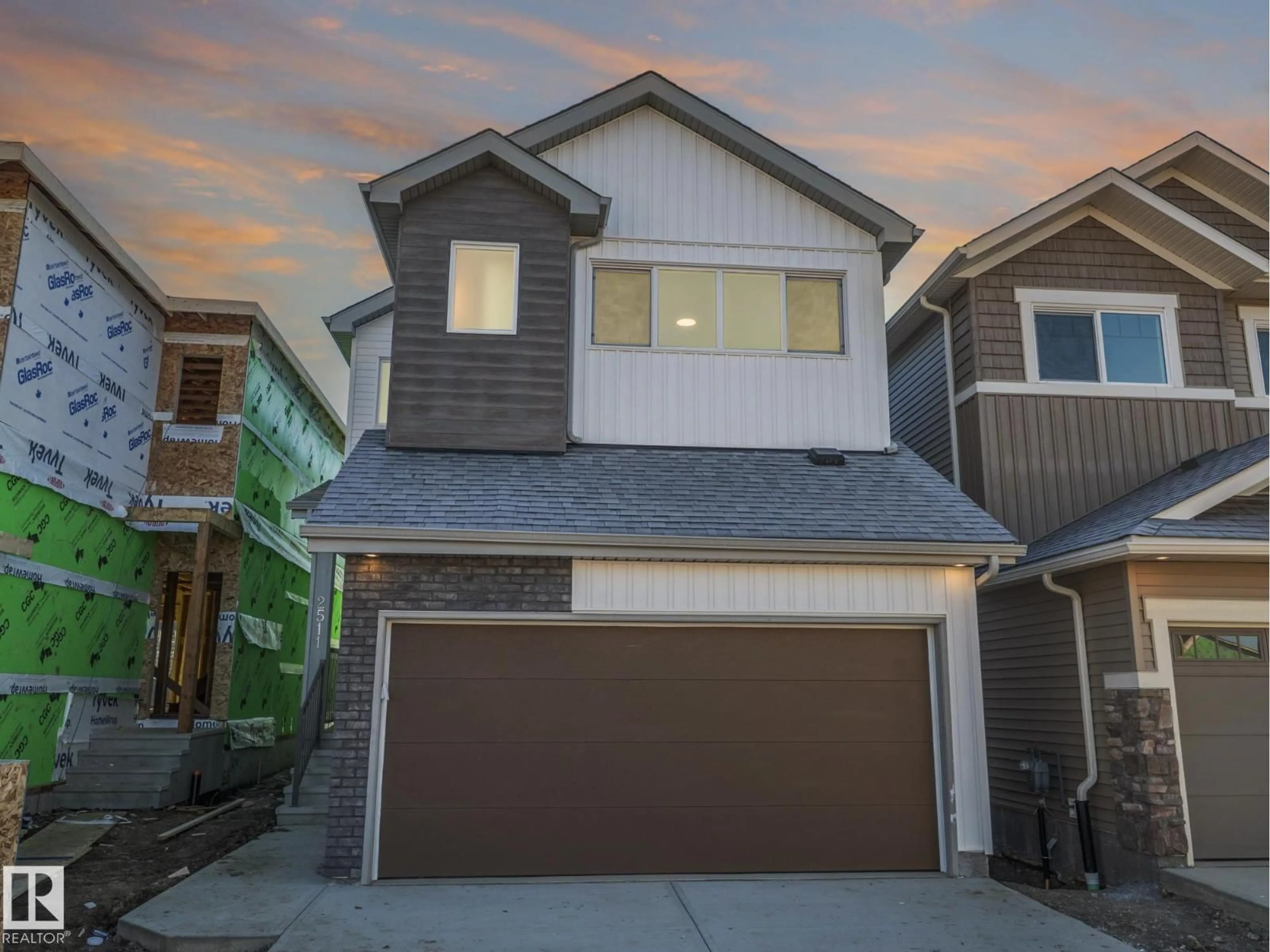 Home with vinyl exterior material, street for NW - 2511 211 ST, Edmonton Alberta T6M3H1