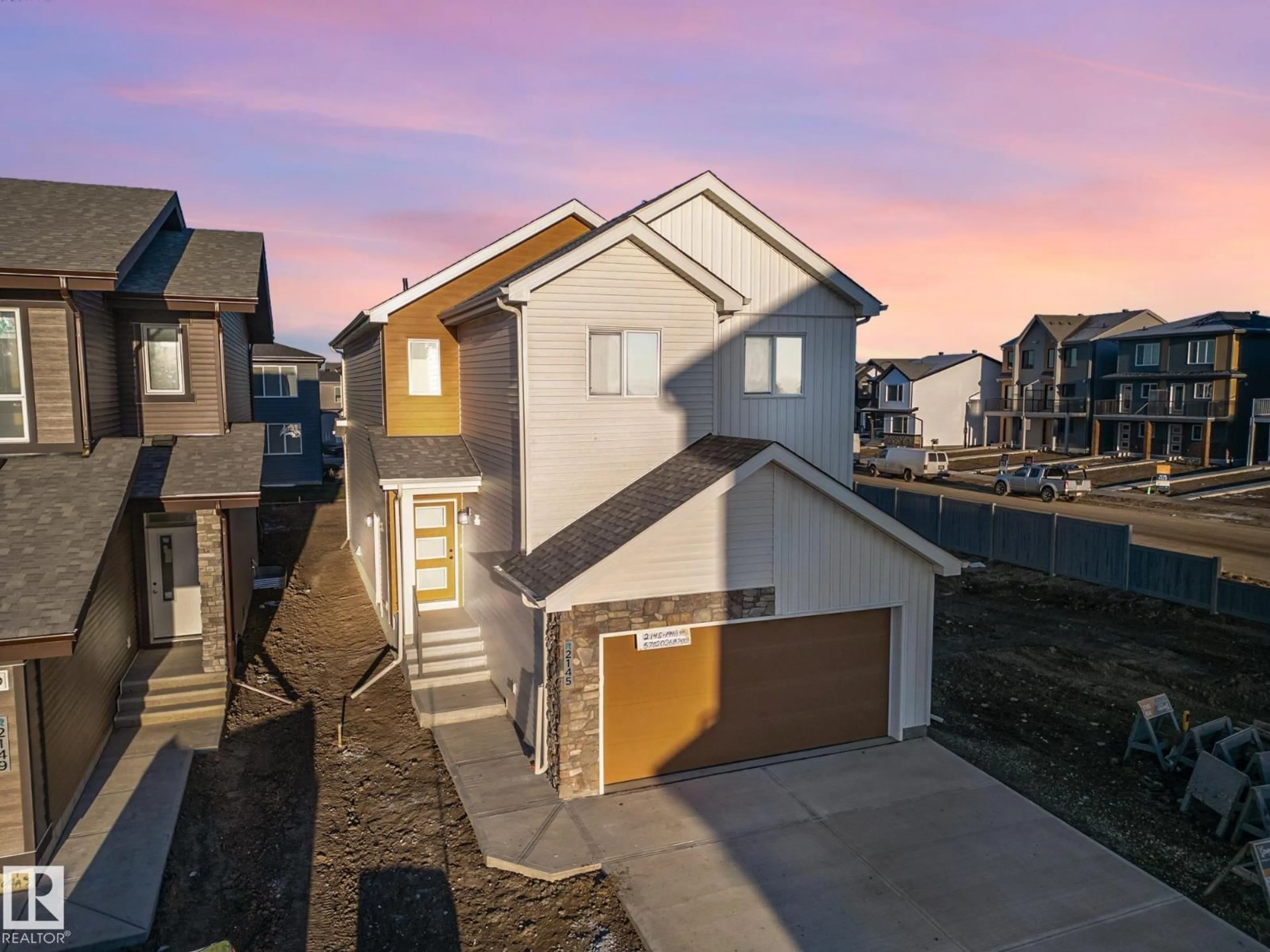 A pic from outside/outdoor area/front of a property/back of a property/a pic from drone, street for NW - 2145 194A ST, Edmonton Alberta T6M3J3