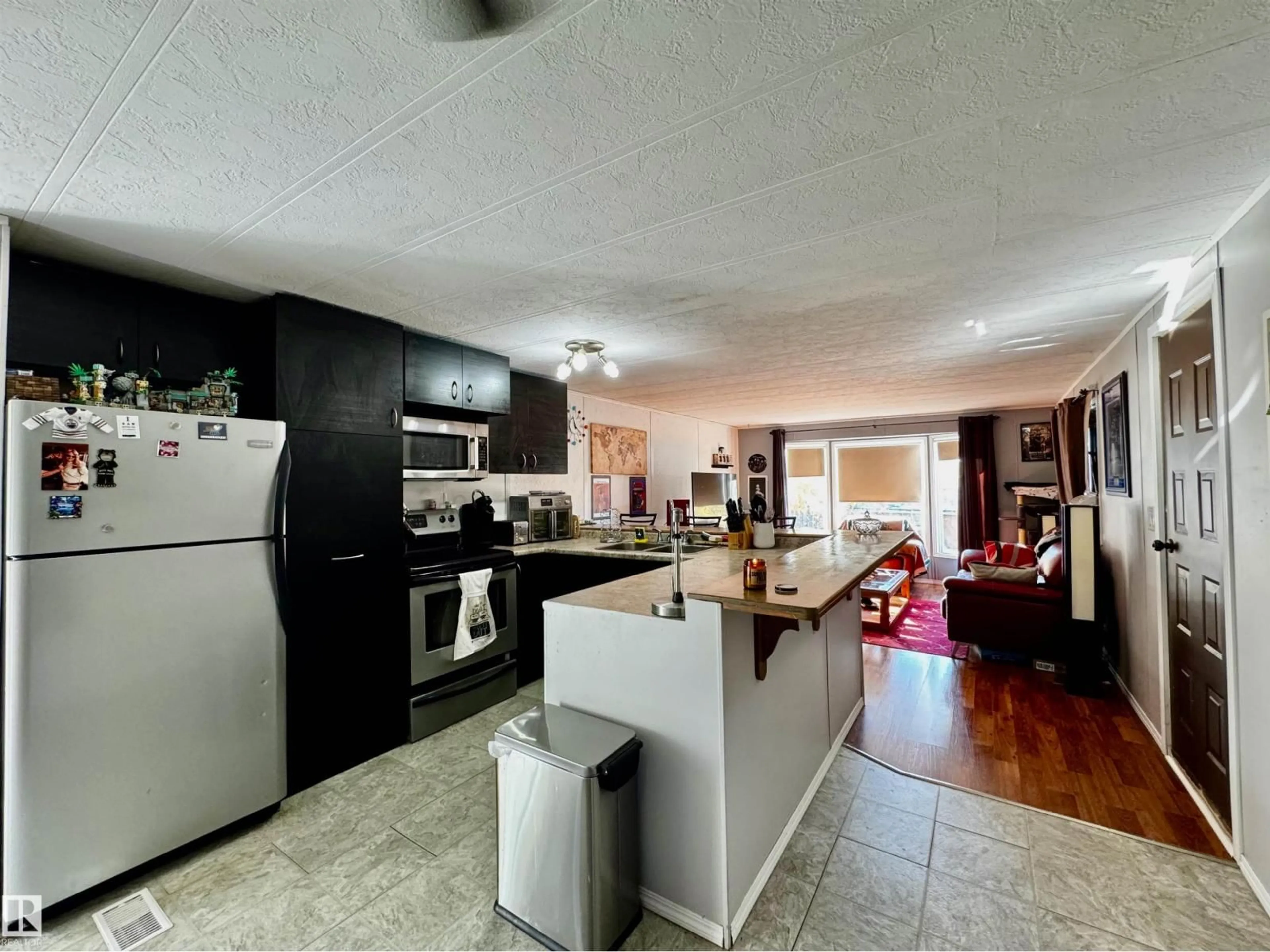 Open concept kitchen, unknown for 17 - 2251 50 ST, Drayton Valley Alberta T7A1M7