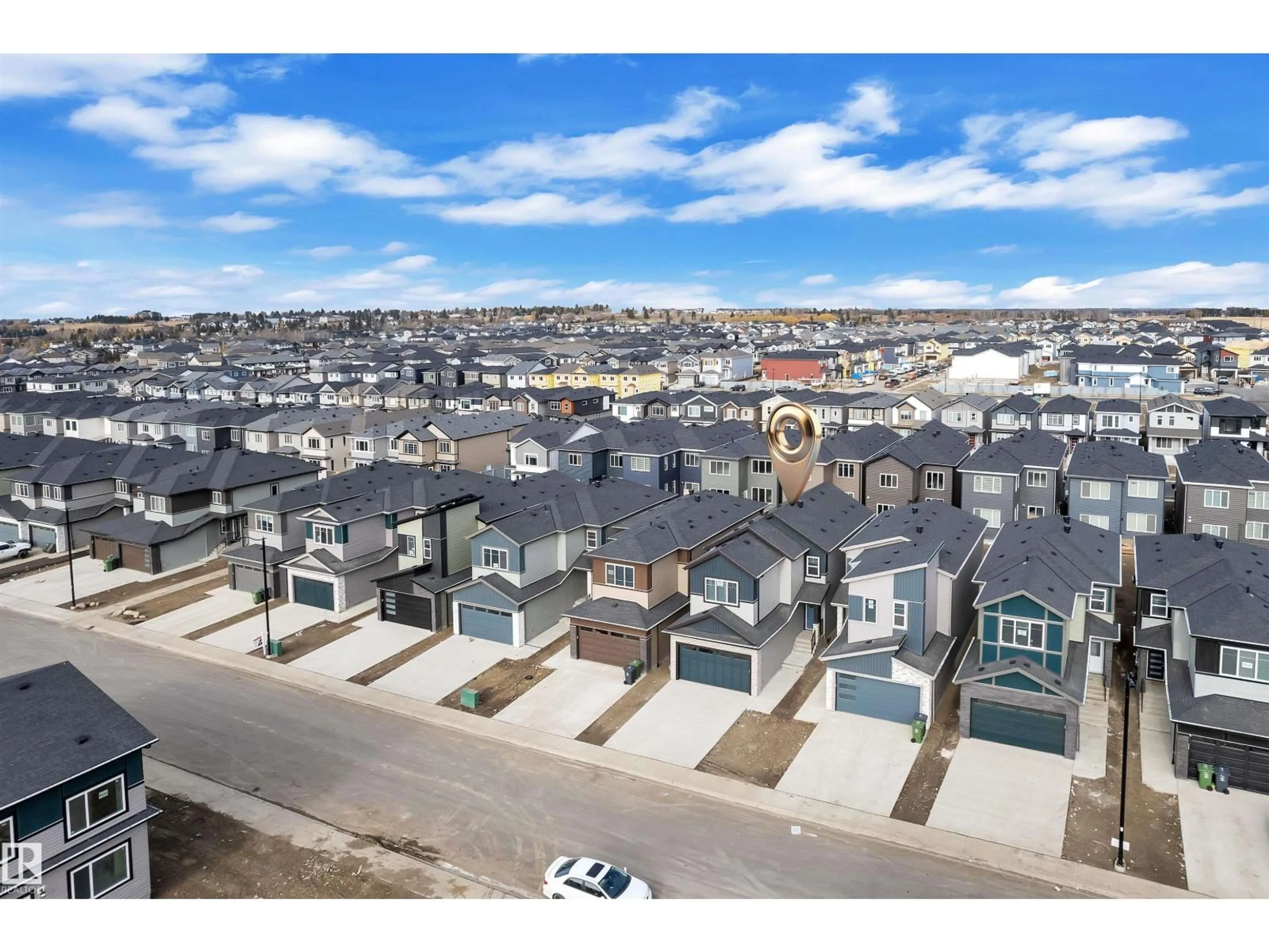 A pic from outside/outdoor area/front of a property/back of a property/a pic from drone, unknown for 3516 41 AV, Beaumont Alberta T4X3H3