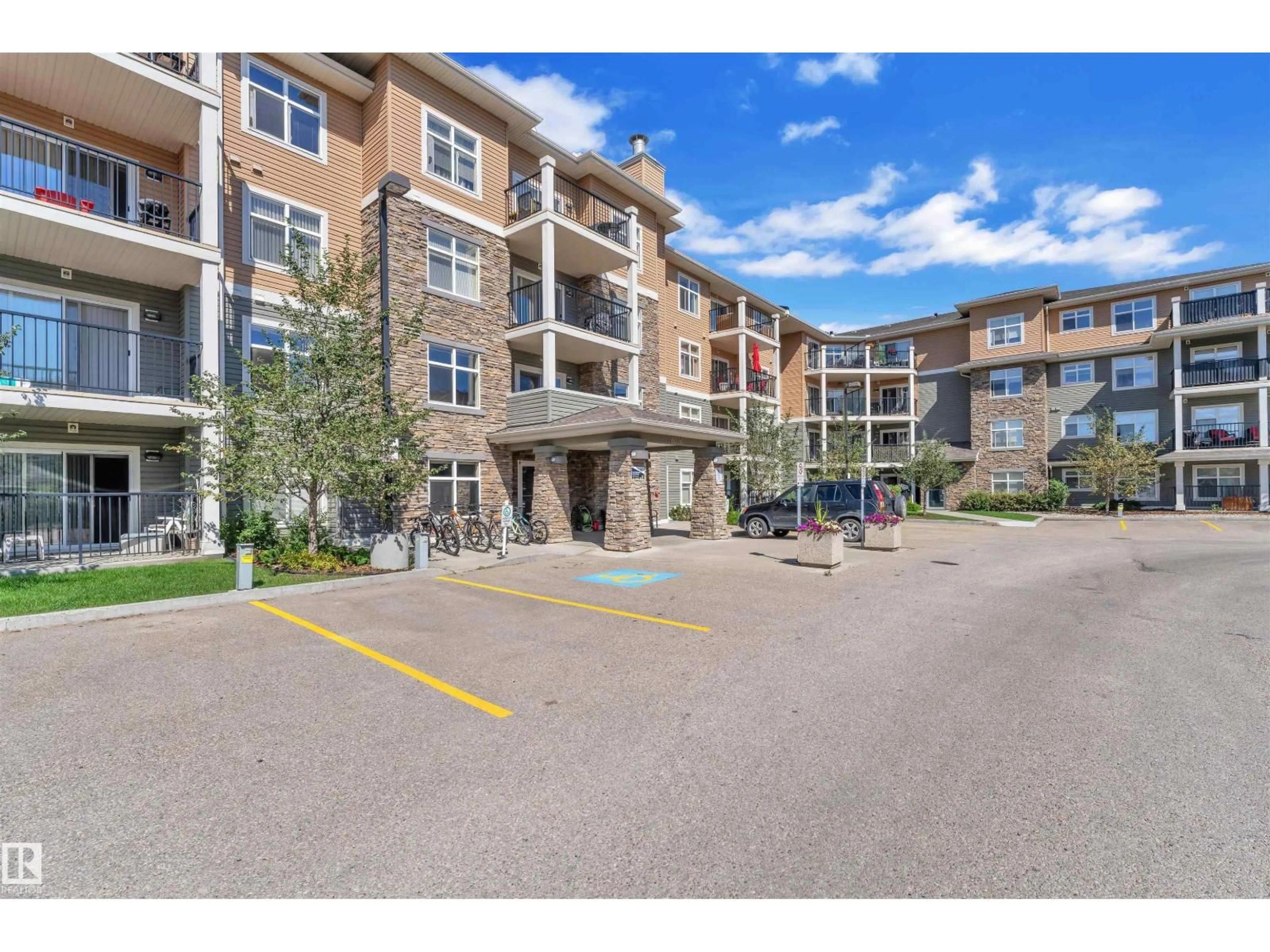 A pic from outside/outdoor area/front of a property/back of a property/a pic from drone, unknown for 6076 - 228 SCHONSEE WY, Edmonton Alberta T5Z0K8