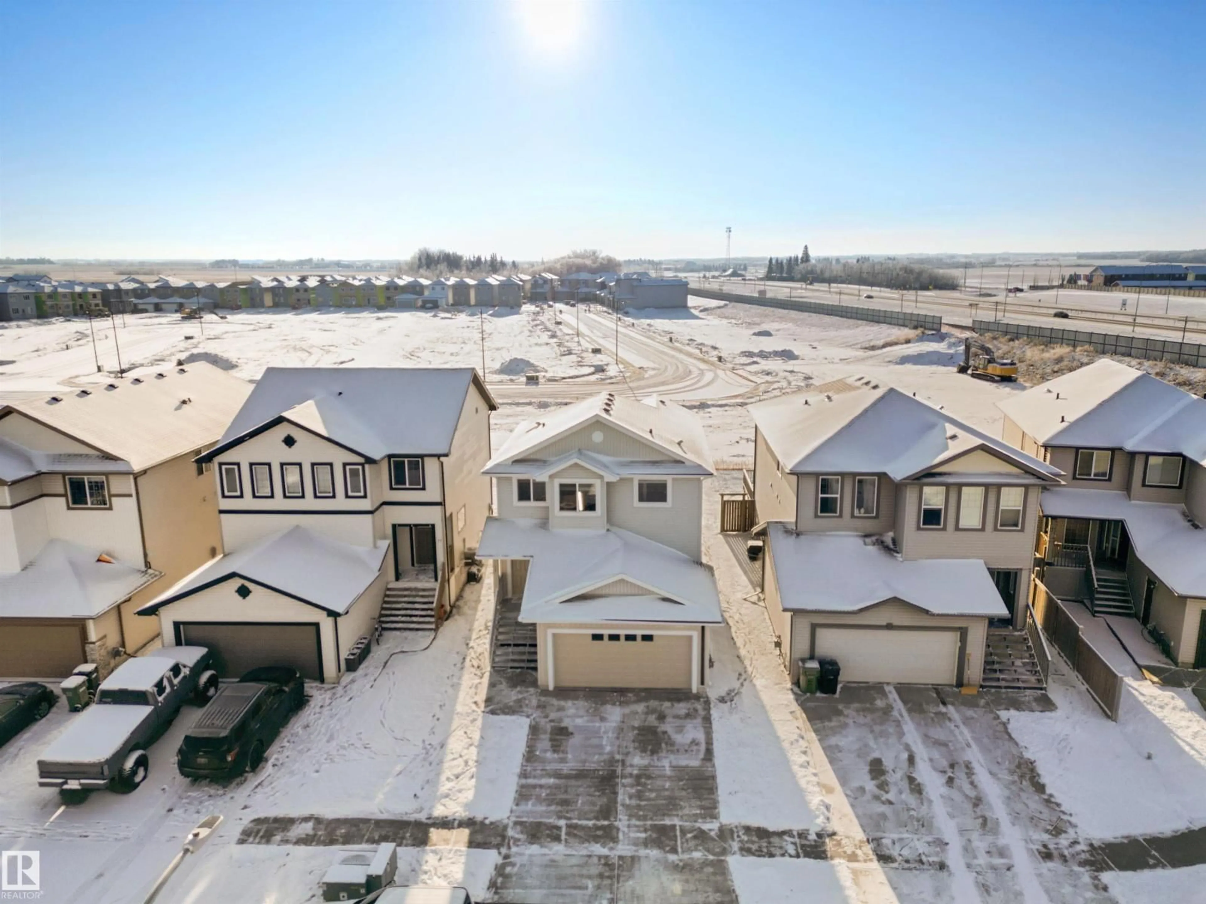 A pic from outside/outdoor area/front of a property/back of a property/a pic from drone, street for 75 DUNLOP WD, Leduc Alberta T9E0N3