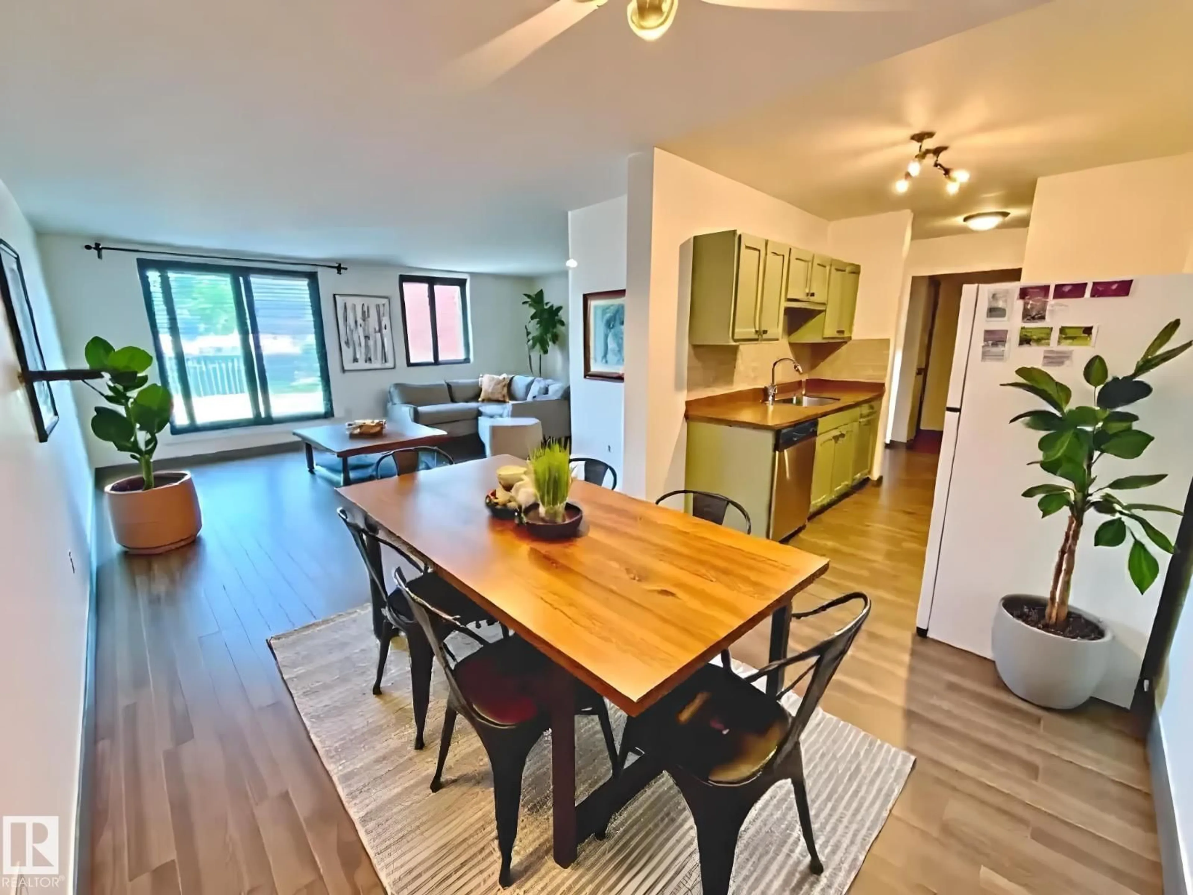 Open concept kitchen, wood/laminate floor for #409 - 10145 109 ST, Edmonton Alberta T5J3M5