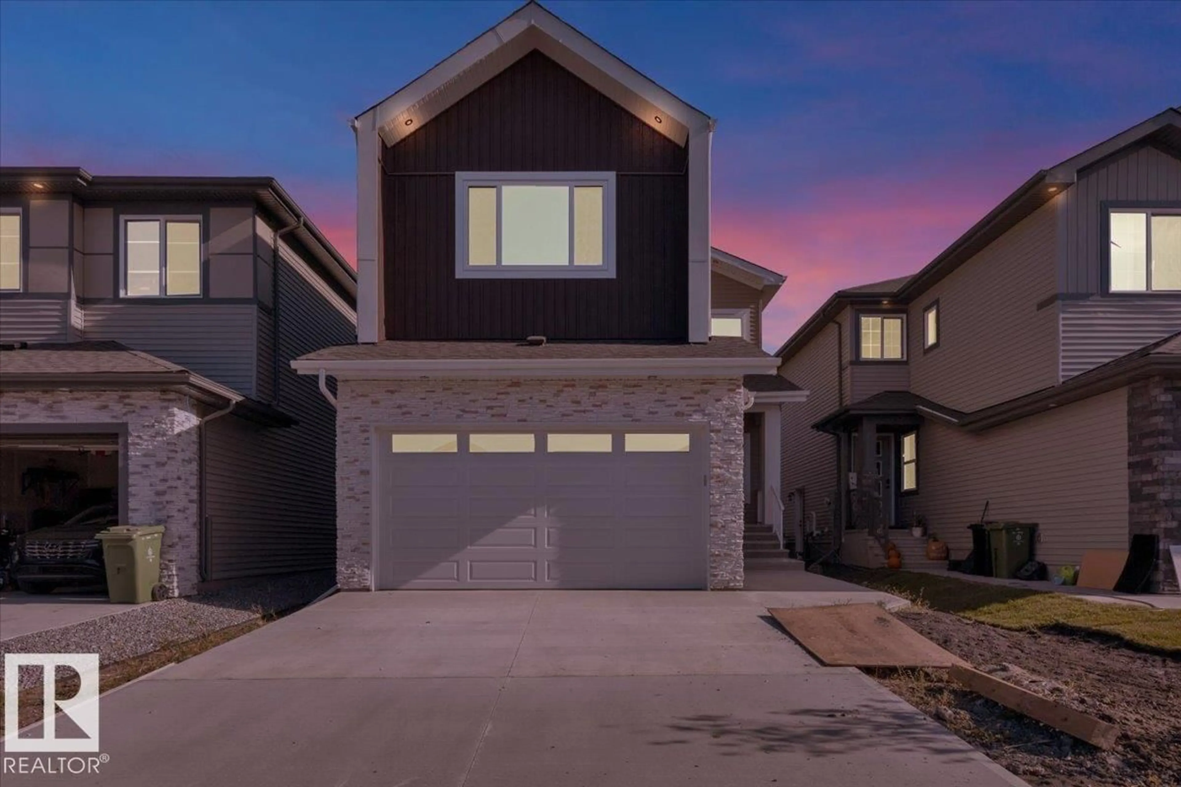 Home with vinyl exterior material, street for 63 WAVERLY WY, Fort Saskatchewan Alberta T8L0Z8