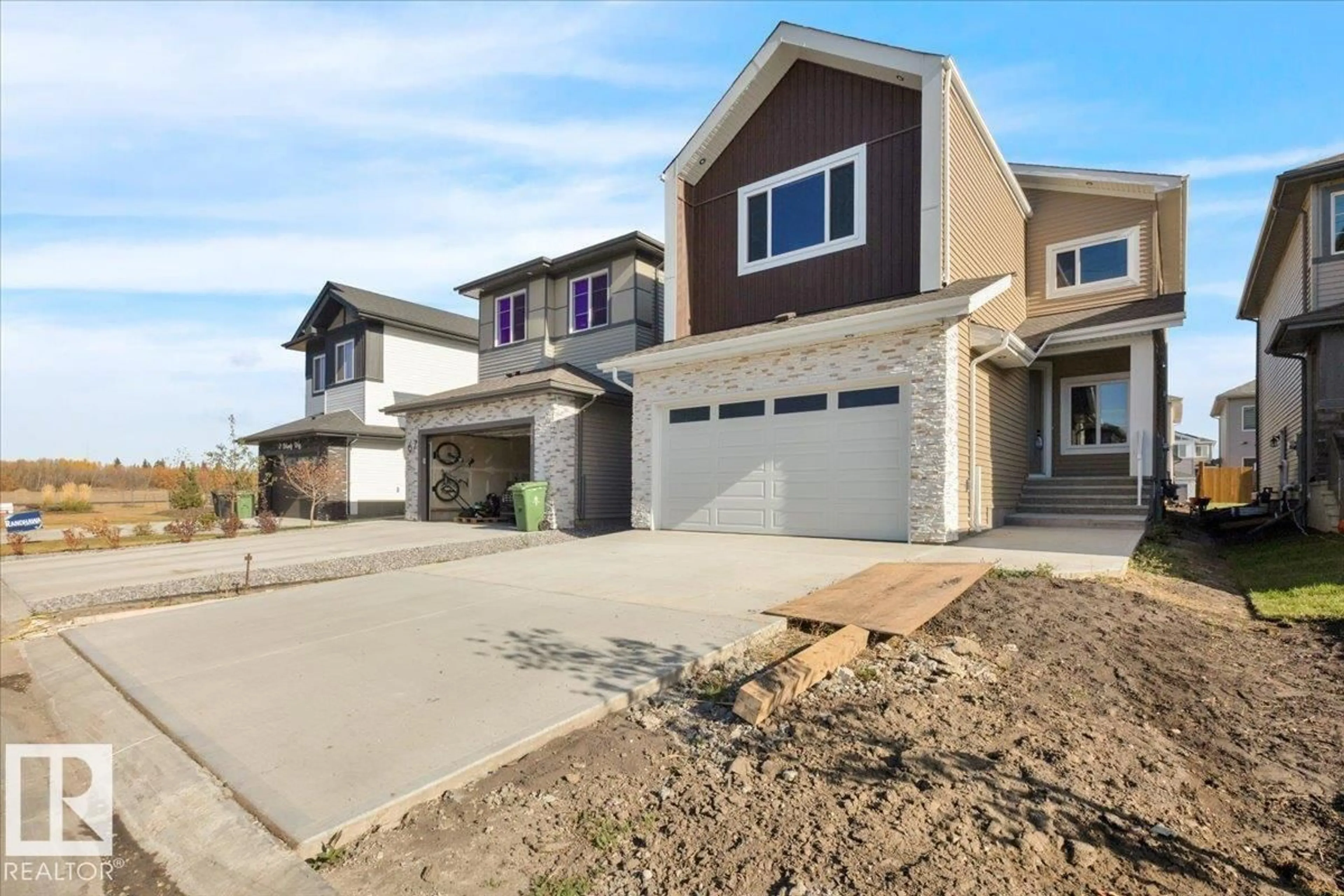 Home with brick exterior material, street for 63 WAVERLY WY, Fort Saskatchewan Alberta T8L0Z8