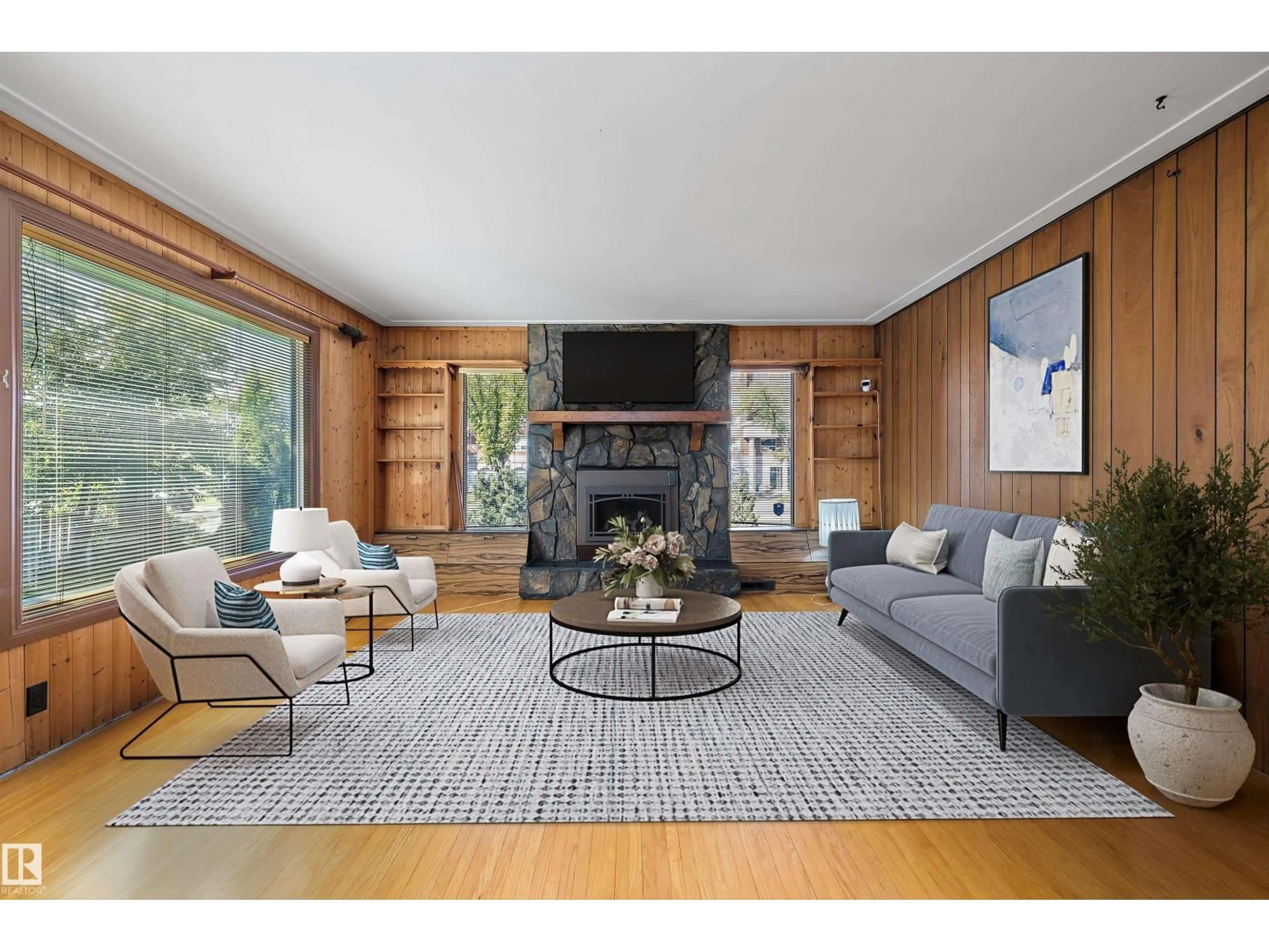 Living room with furniture, wood/laminate floor for NW - 9911 149 ST, Edmonton Alberta T5P1K7