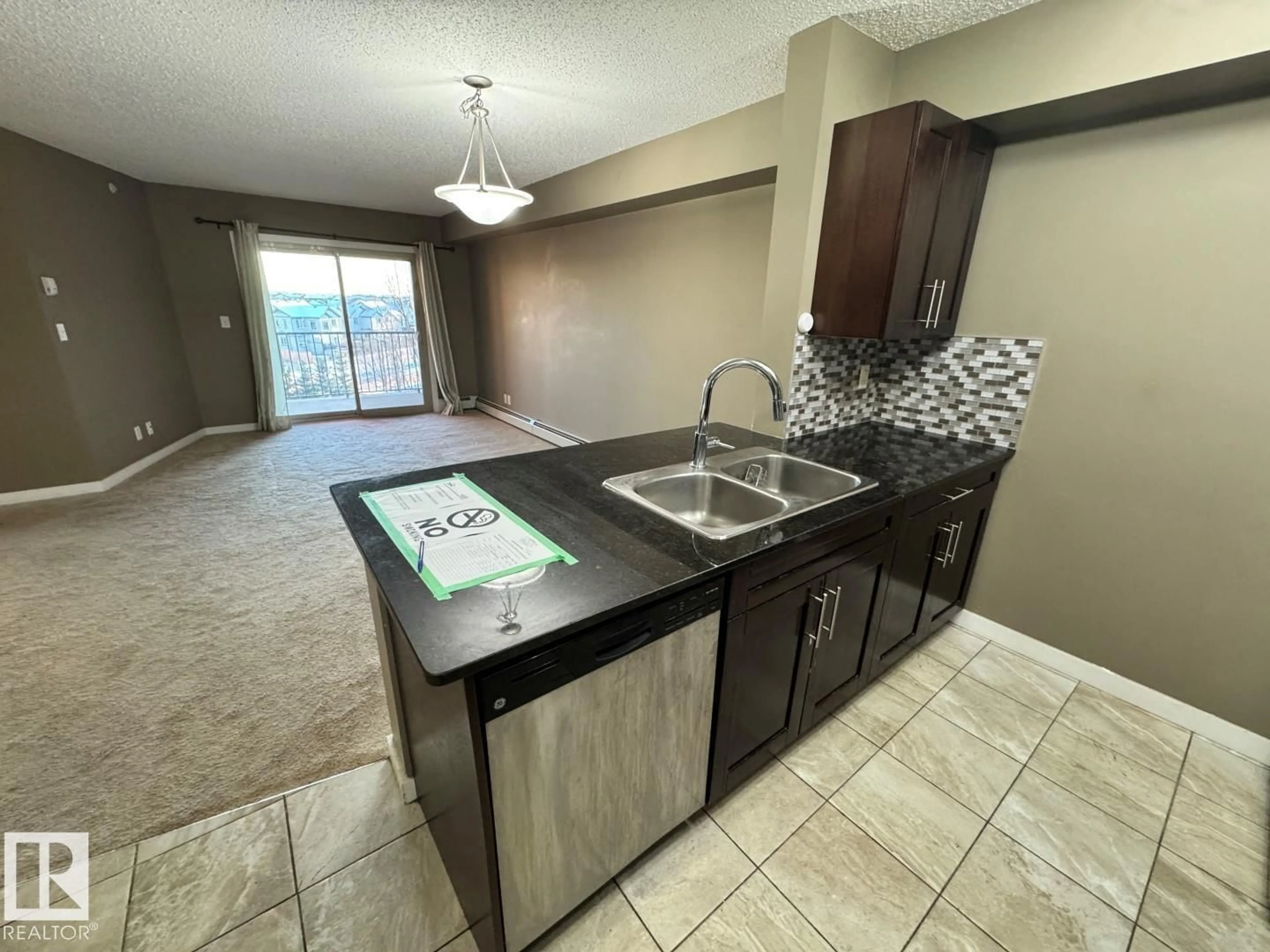 Open concept kitchen, ceramic/tile floor for 107 - 421 WATT CM, Edmonton Alberta T6X2C6