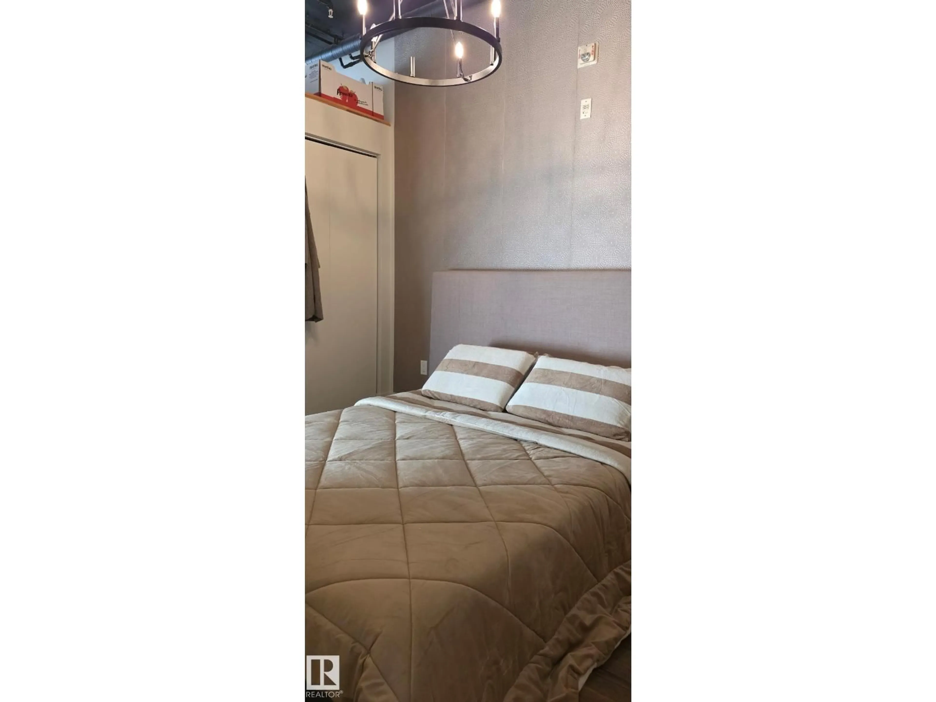 Bedroom with bed, unknown for #1012 - 1012 JASPER AV, Edmonton Alberta T5X4R7